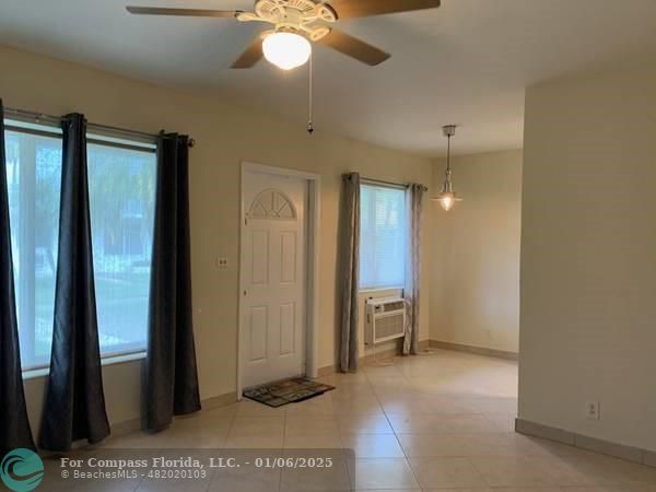 120 Northeast 10th Avenue, Unit 1 Hallandale Beach, FL 33009 - Photo 10 of 18 a view of a bathroom with a shower and a sink