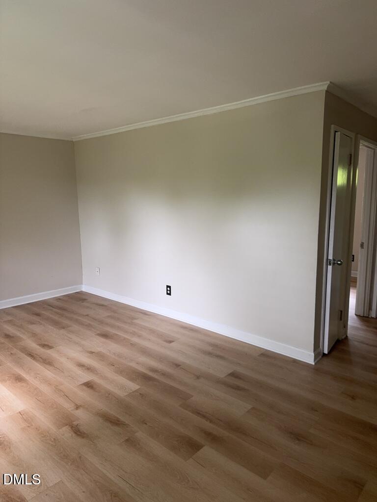 703 Daniels Street, Unit C Raleigh, NC 27605 - Photo 3 of 8 a view of an empty room