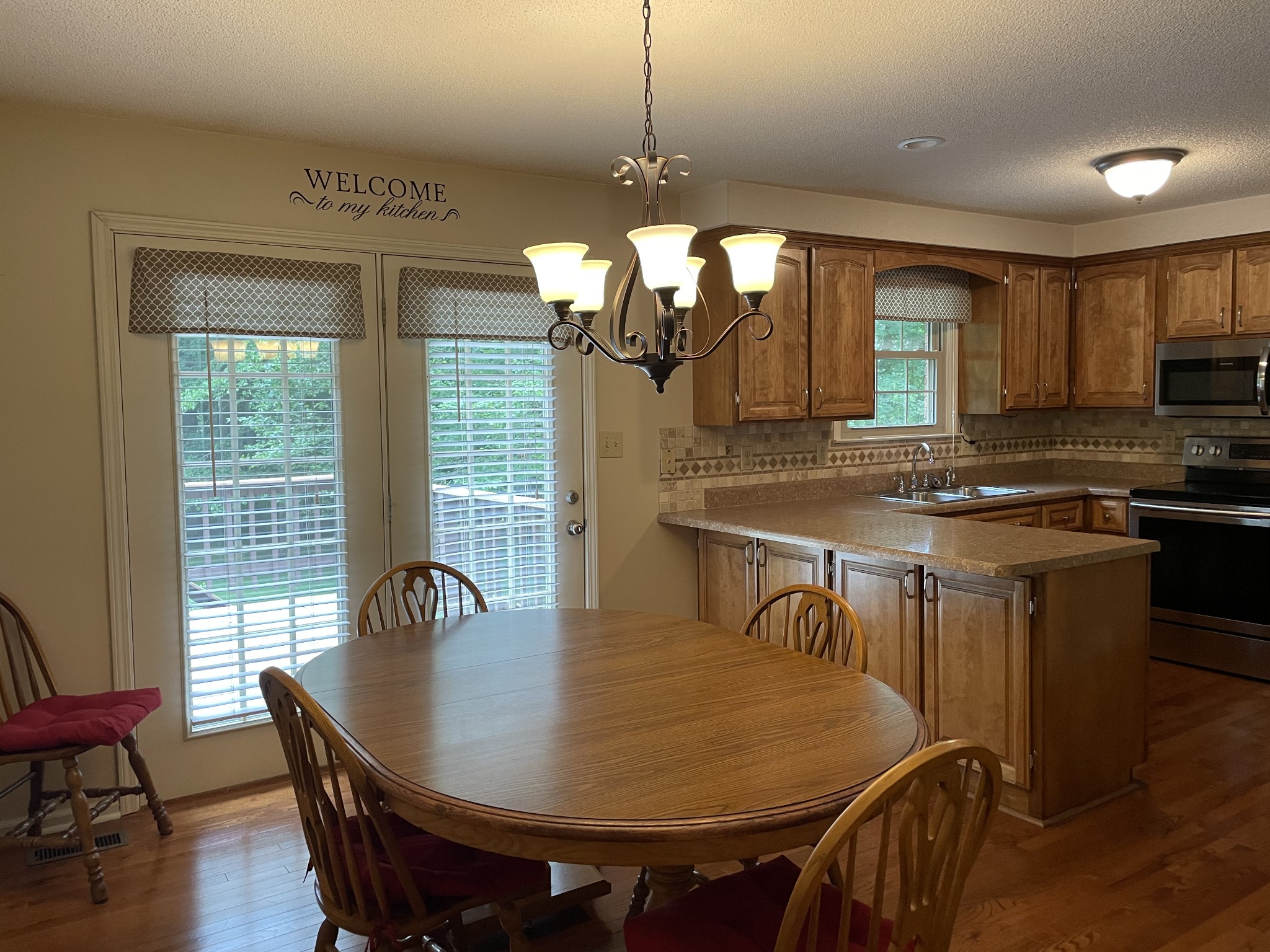 1224 Poplar Ridge Road Chapmansboro, TN 37035 - Photo 21 of 40 a dining room with furniture and window