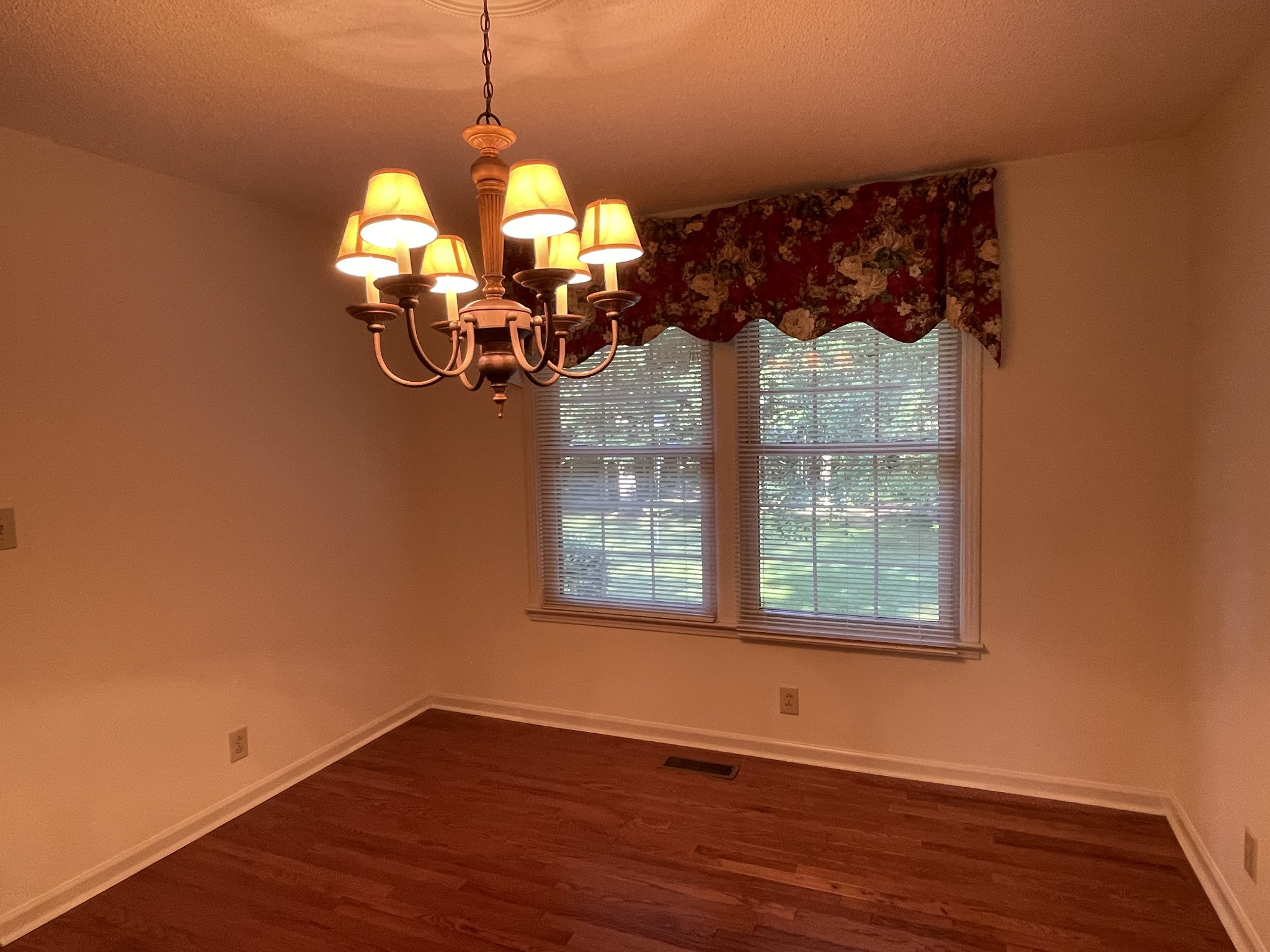 1224 Poplar Ridge Road Chapmansboro, TN 37035 - Photo 25 of 40 a view of a room with wooden floor fan and window