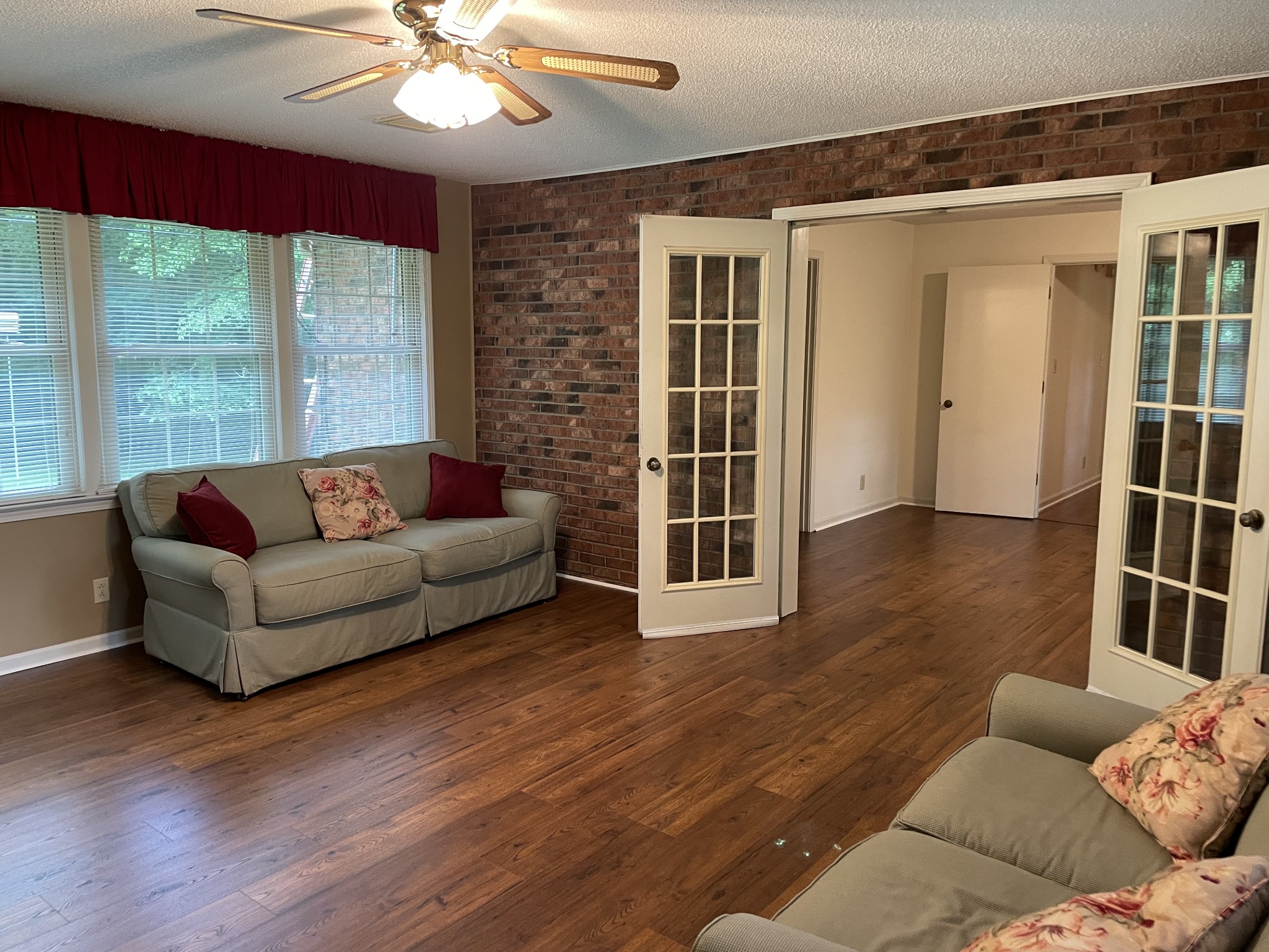 1224 Poplar Ridge Road Chapmansboro, TN 37035 - Photo 28 of 40 a living room with furniture and a large window