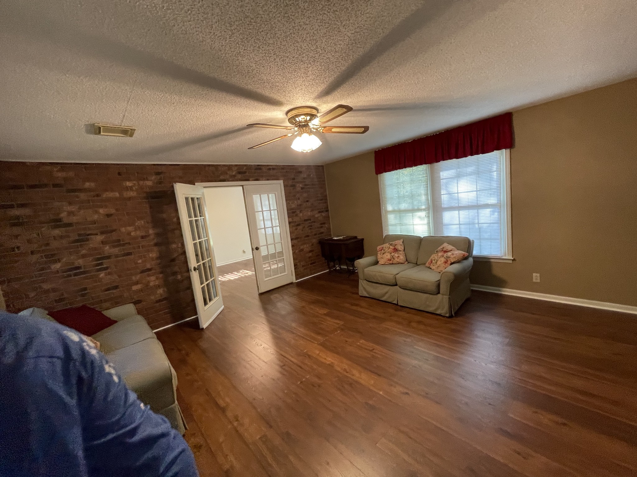 1224 Poplar Ridge Road Chapmansboro, TN 37035 - Photo 29 of 40 a living room with furniture and a large window