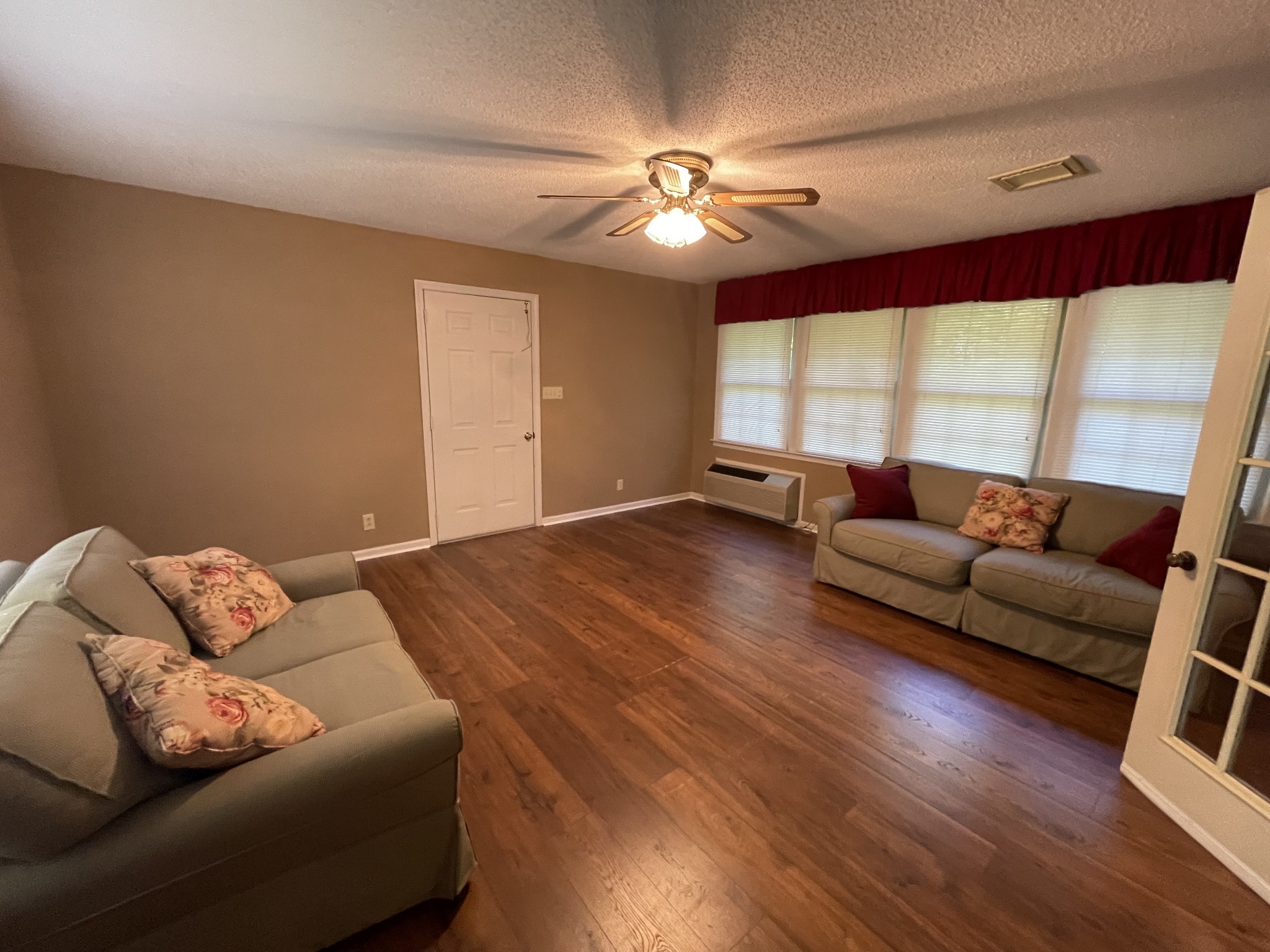 1224 Poplar Ridge Road Chapmansboro, TN 37035 - Photo 31 of 40 a living room with furniture and wooden floor