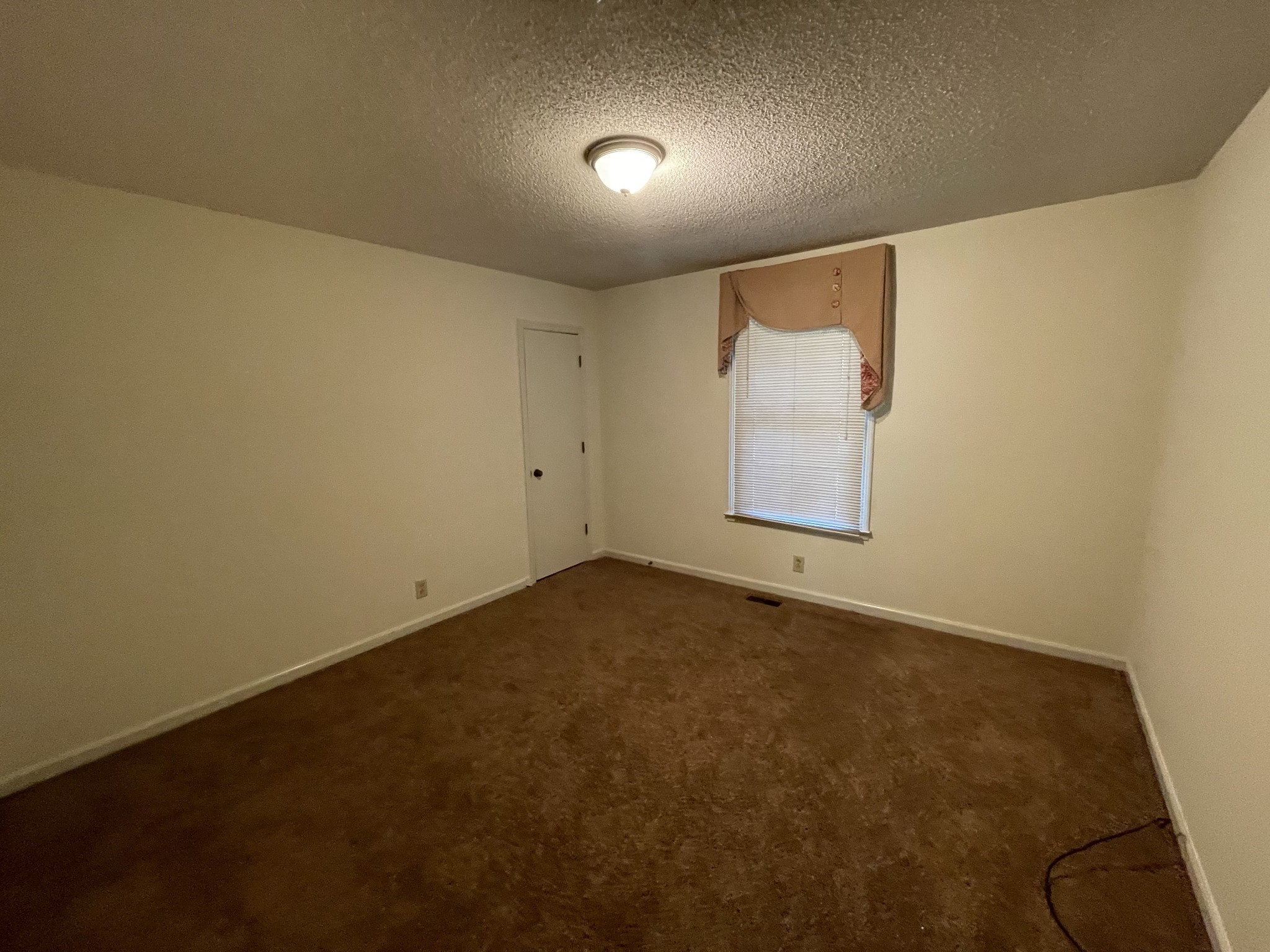 1224 Poplar Ridge Road Chapmansboro, TN 37035 - Photo 32 of 40 an empty room with windows