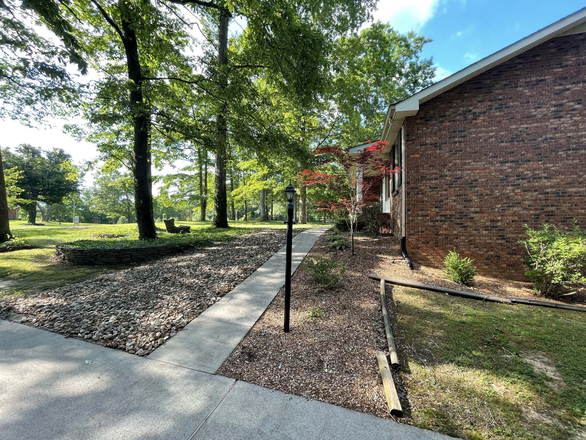 1224 Poplar Ridge Road Chapmansboro, TN 37035 - Photo 5 of 40 a backyard of a house with lots of green space