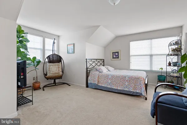 a room with furniture and a flat screen tv