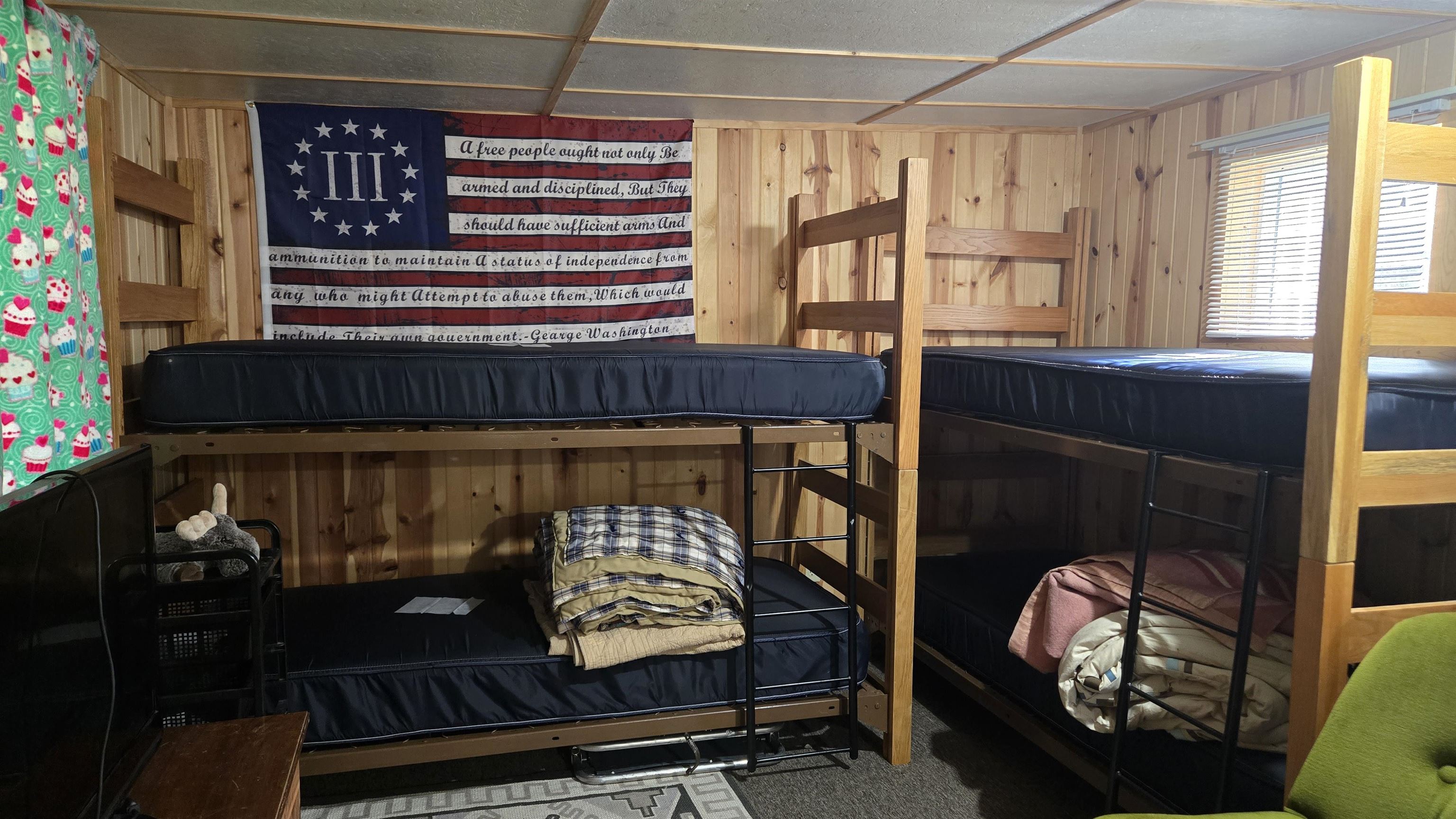 7178 Gold Mine Road Orr, MN 55771 - Photo 23 of 36 Bedroom featuring wood walls