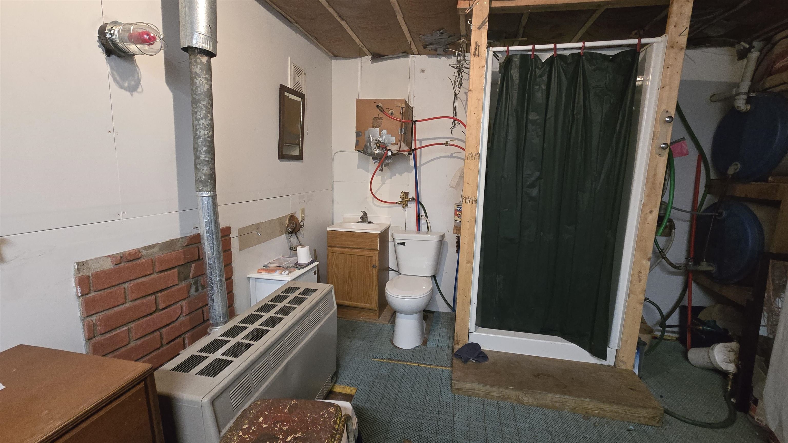 7178 Gold Mine Road Orr, MN 55771 - Photo 27 of 36 Full bathroom featuring a stall shower and vanity