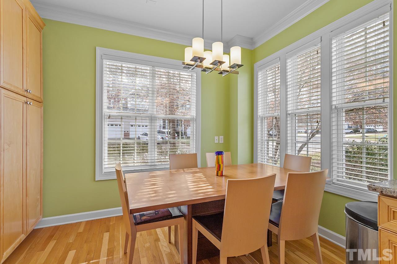 203 Towne Ridge Lane Chapel Hill, NC 27516 - Photo 15 of 38 a view of a dining room with furniture window and outside view