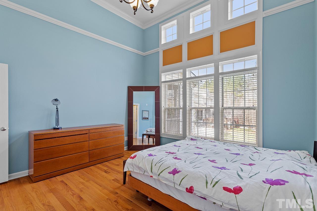 203 Towne Ridge Lane Chapel Hill, NC 27516 - Photo 17 of 38 a bedroom with a bed and a window