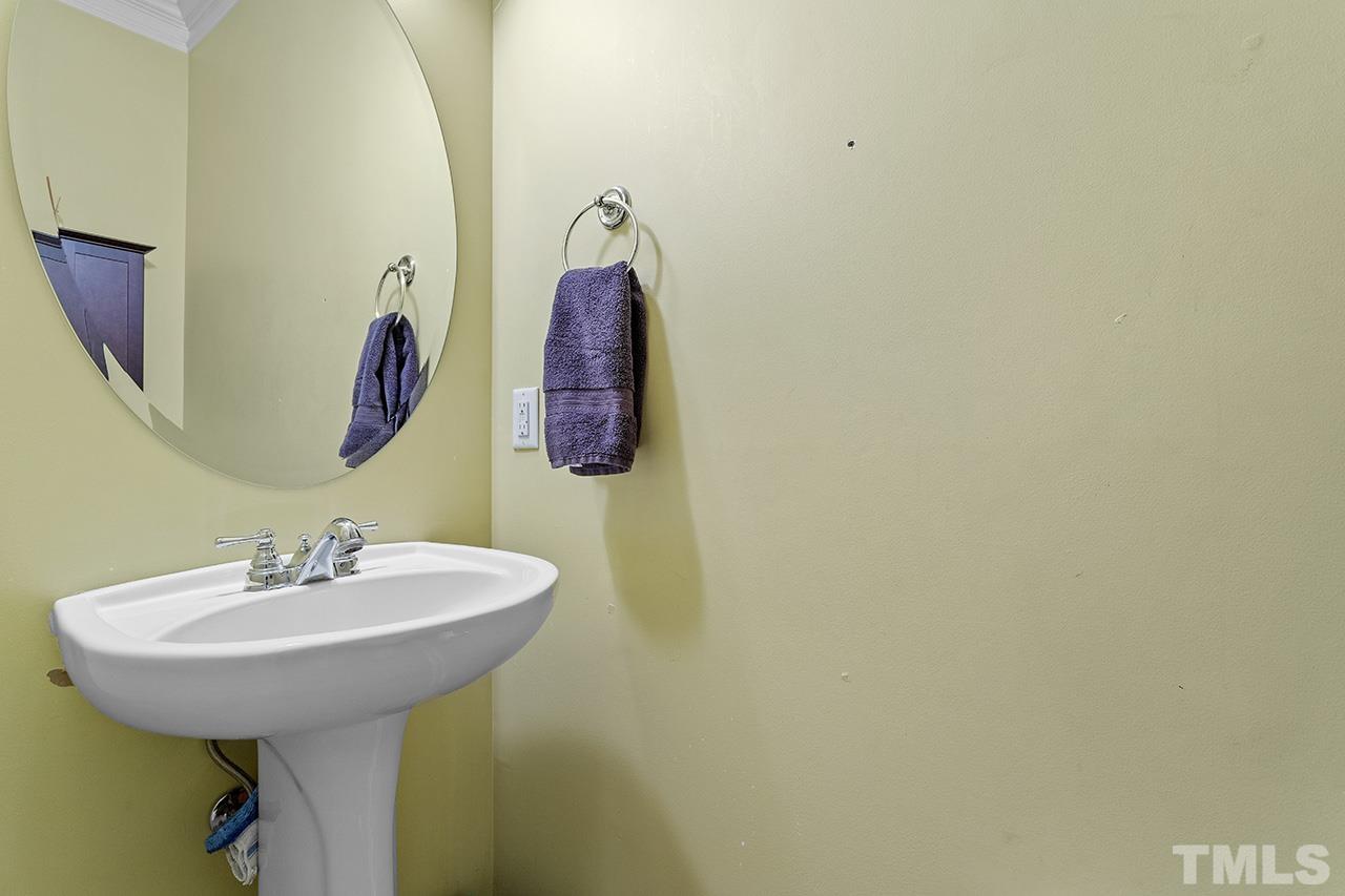 203 Towne Ridge Lane Chapel Hill, NC 27516 - Photo 20 of 38 a bathroom with a sink and a mirror