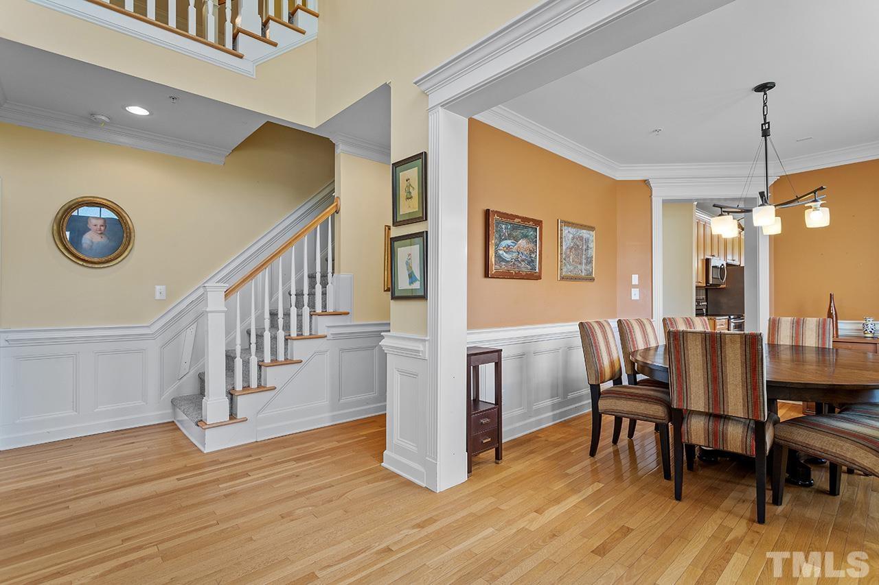203 Towne Ridge Lane Chapel Hill, NC 27516 - Photo 2 of 38 a view of a dining room with furniture window and wooden floor