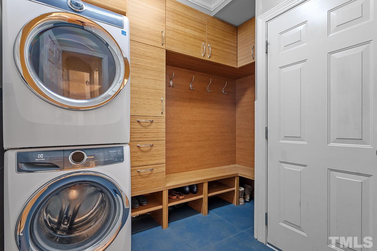 203 Towne Ridge Lane Chapel Hill, NC 27516 - Photo 21 of 38 a utility room with dryer and washer