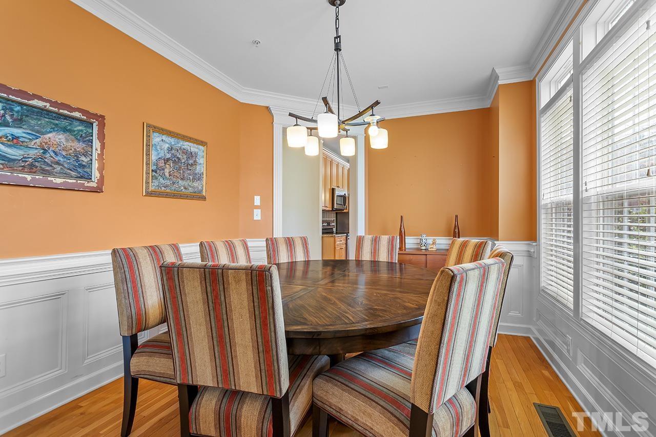 203 Towne Ridge Lane Chapel Hill, NC 27516 - Photo 10 of 38 a view of a dining room with furniture window and wooden floor