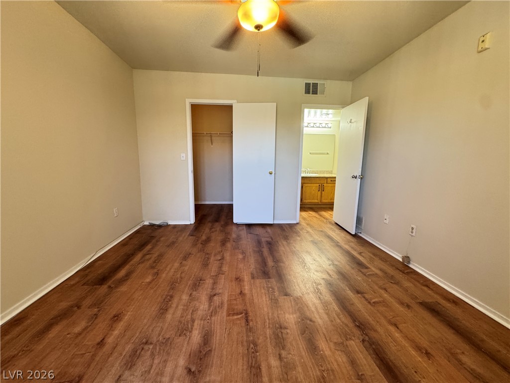 7255 West Sunset Road, Unit 2111 Las Vegas, NV 89113 - Photo 14 of 33 Rich hardwood-style flooring creates a warm and inviting atmosphere.