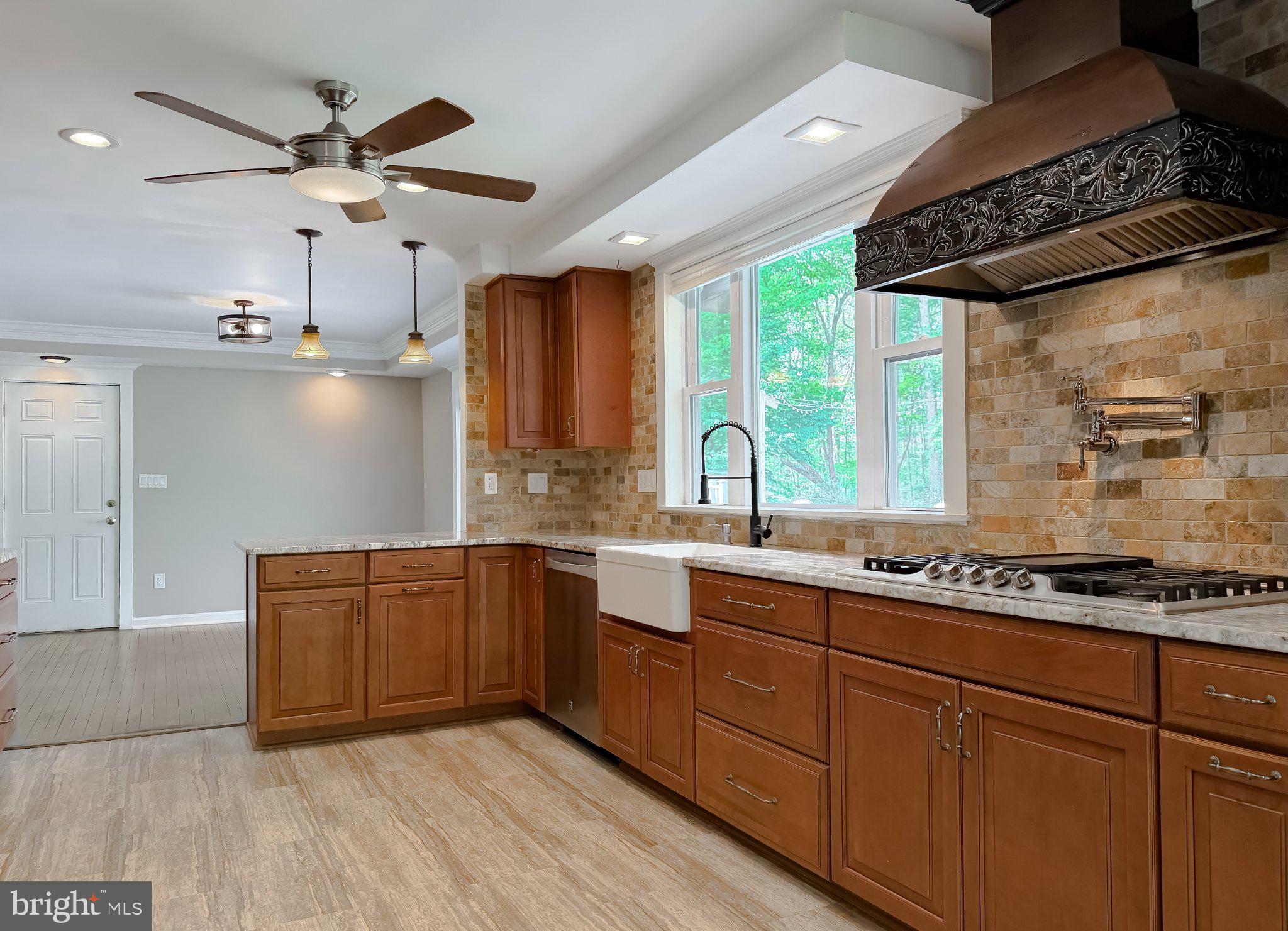 2420 Cecil Lane Huntingtown, MD 20639 - Photo 16 of 72 Modern kitchen with natural light.