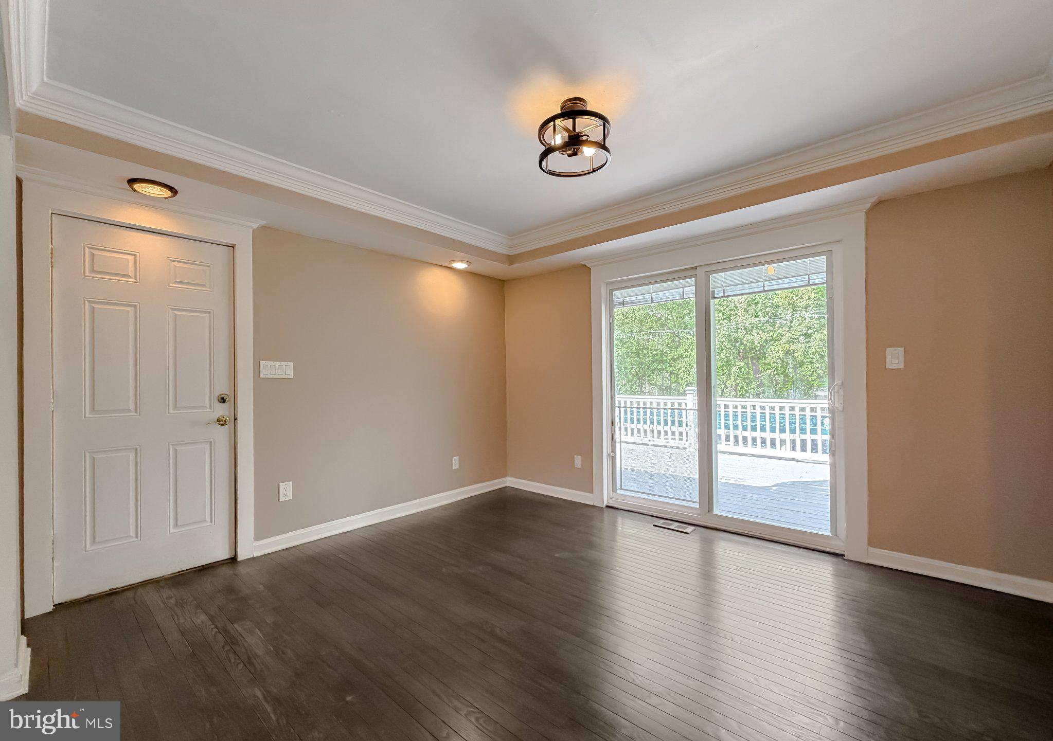 2420 Cecil Lane Huntingtown, MD 20639 - Photo 23 of 72 Bright and airy living space awaits.