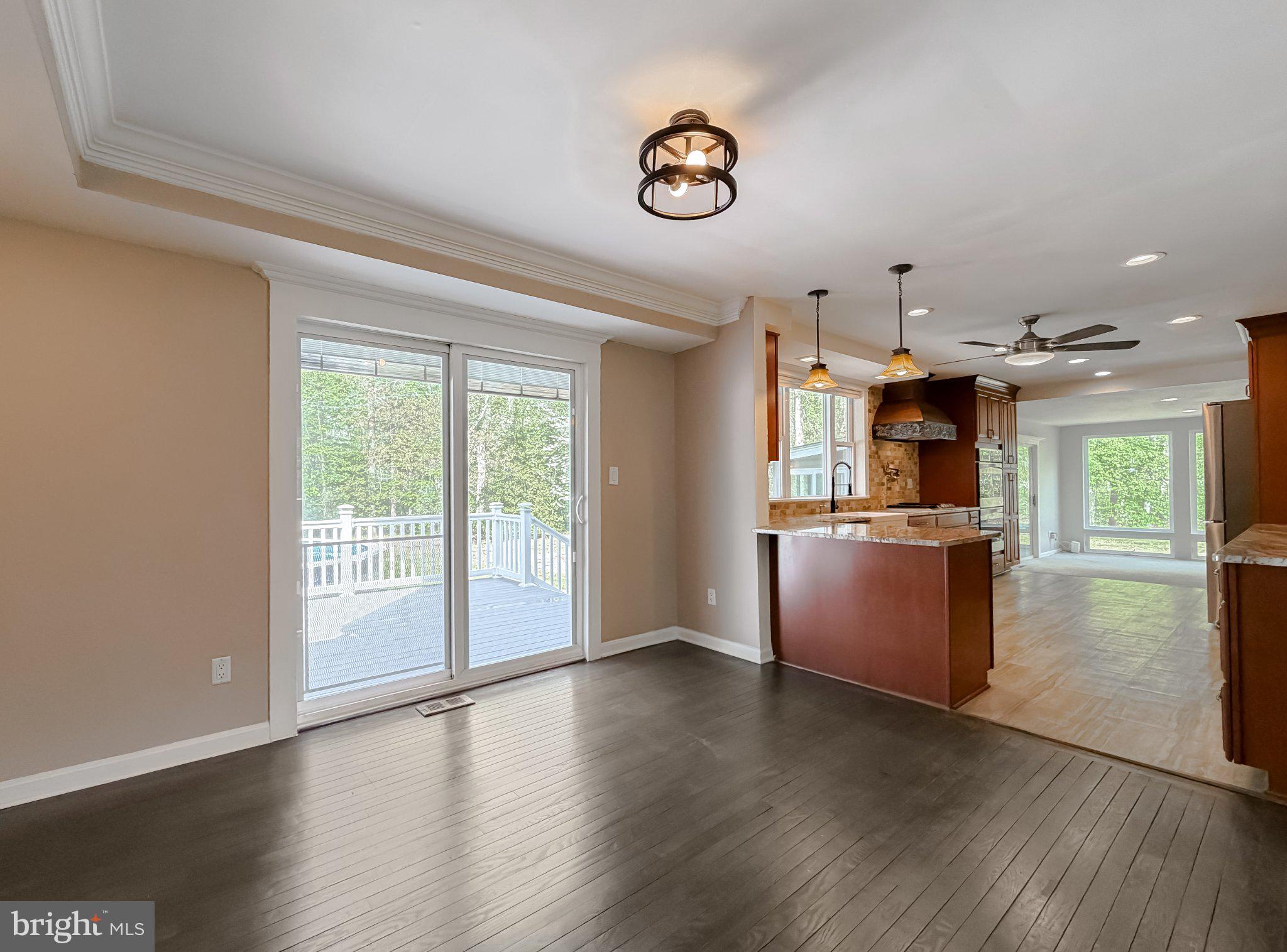 2420 Cecil Lane Huntingtown, MD 20639 - Photo 25 of 72 Bright and airy open living space.