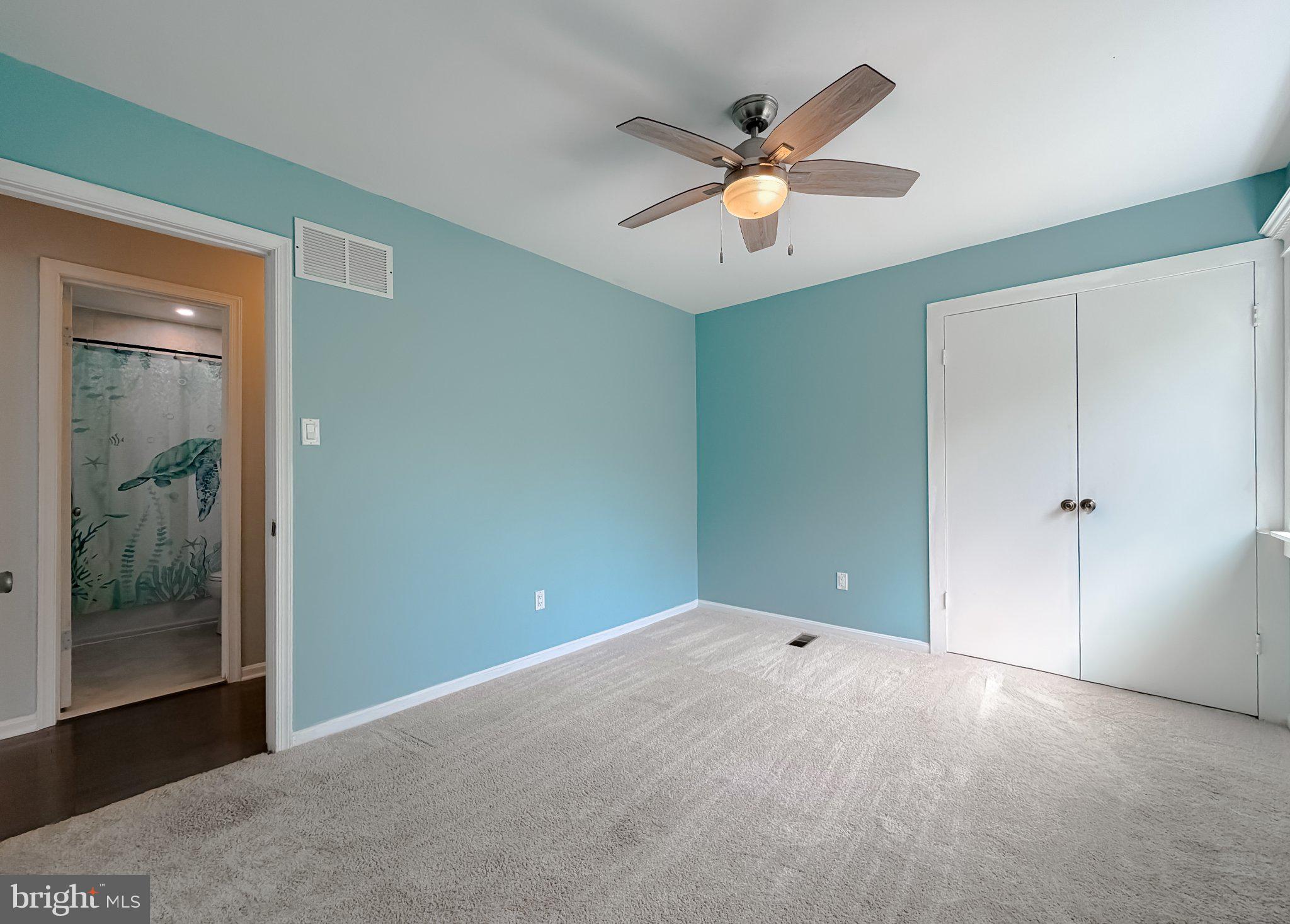 2420 Cecil Lane Huntingtown, MD 20639 - Photo 30 of 72 Serene blue retreat with natural light.