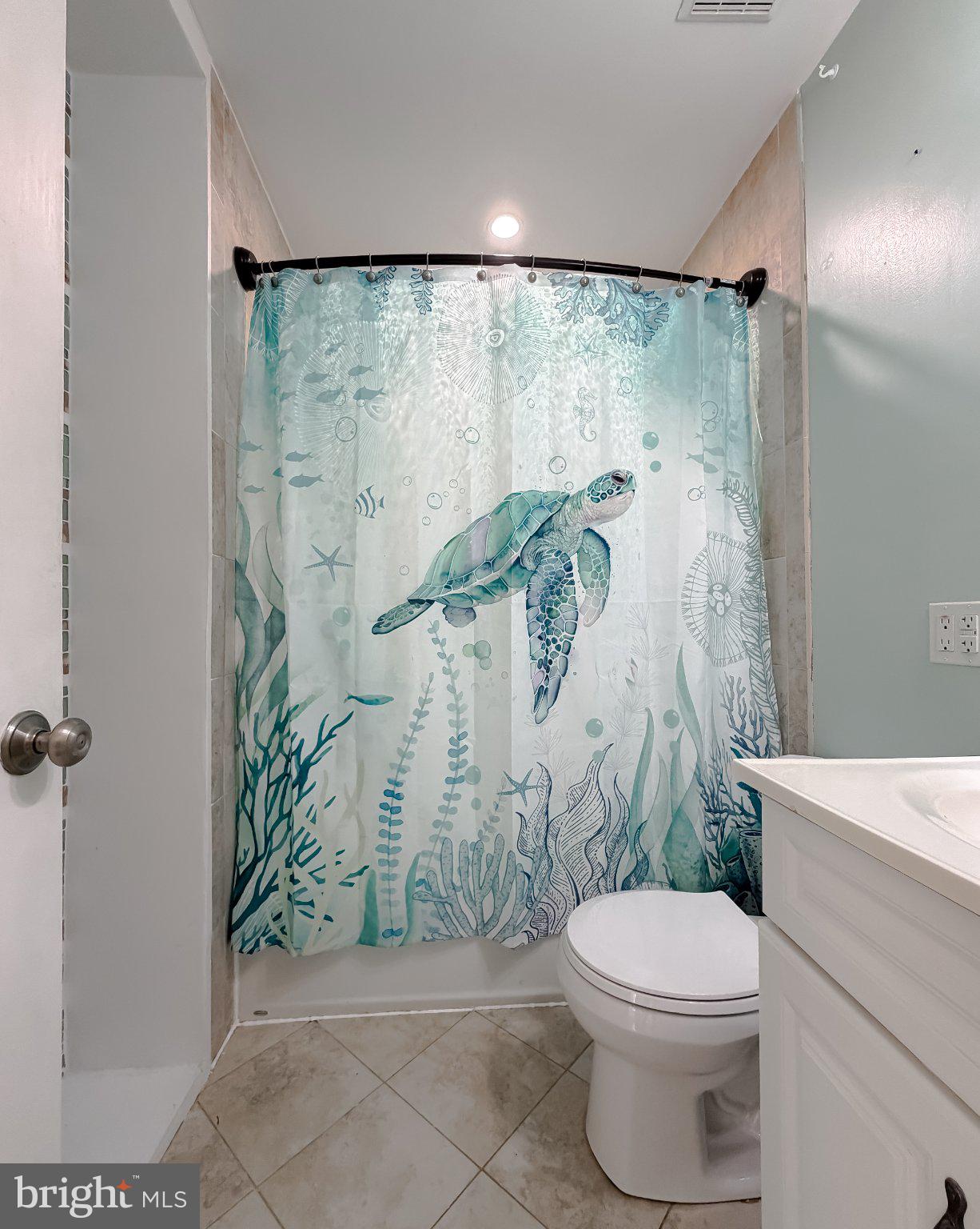 2420 Cecil Lane Huntingtown, MD 20639 - Photo 33 of 72 Serene bathroom with ocean vibes.
