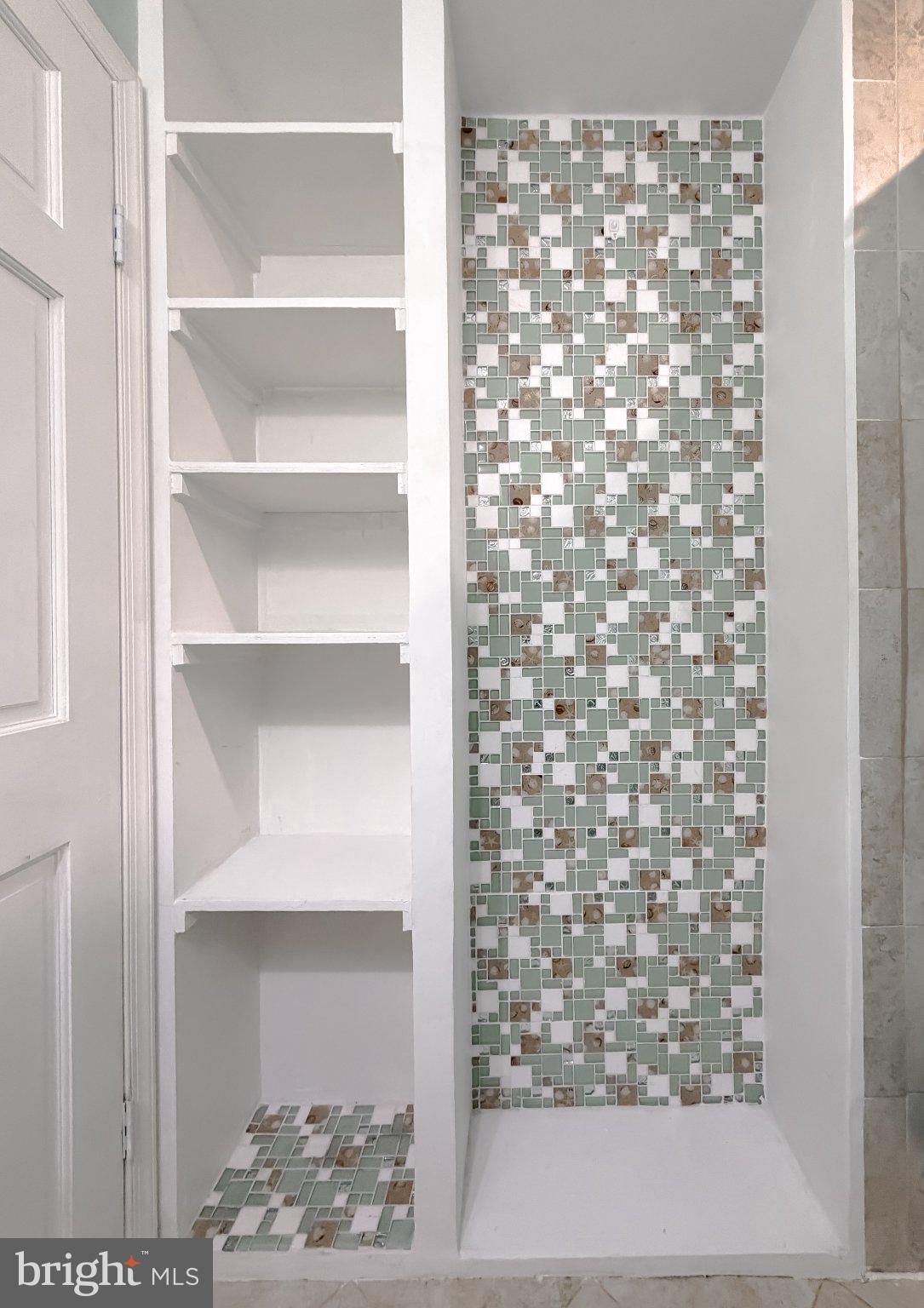2420 Cecil Lane Huntingtown, MD 20639 - Photo 35 of 72 Stylish storage meets mosaic elegance.