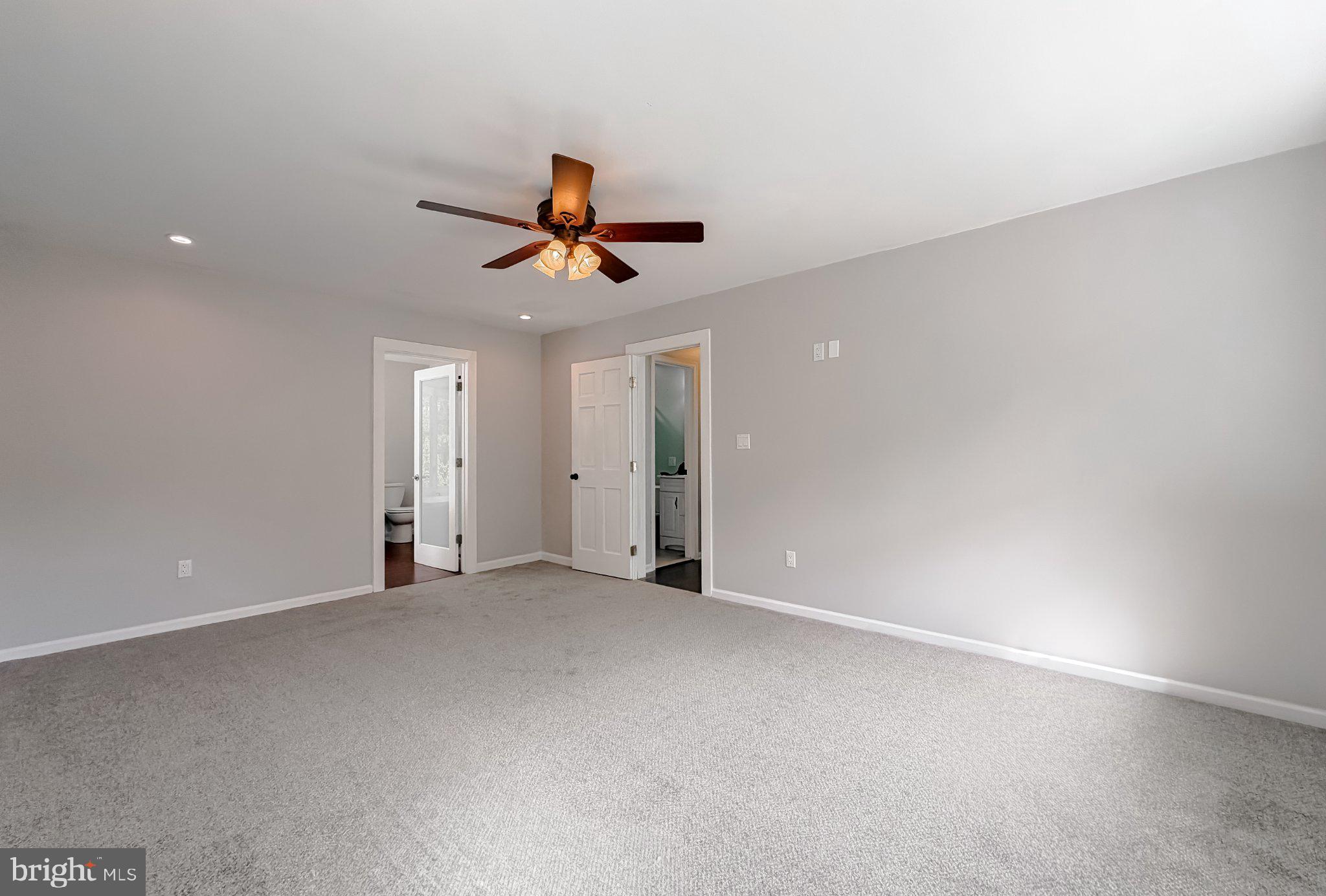 2420 Cecil Lane Huntingtown, MD 20639 - Photo 42 of 72 Spacious, serene bedroom retreat.