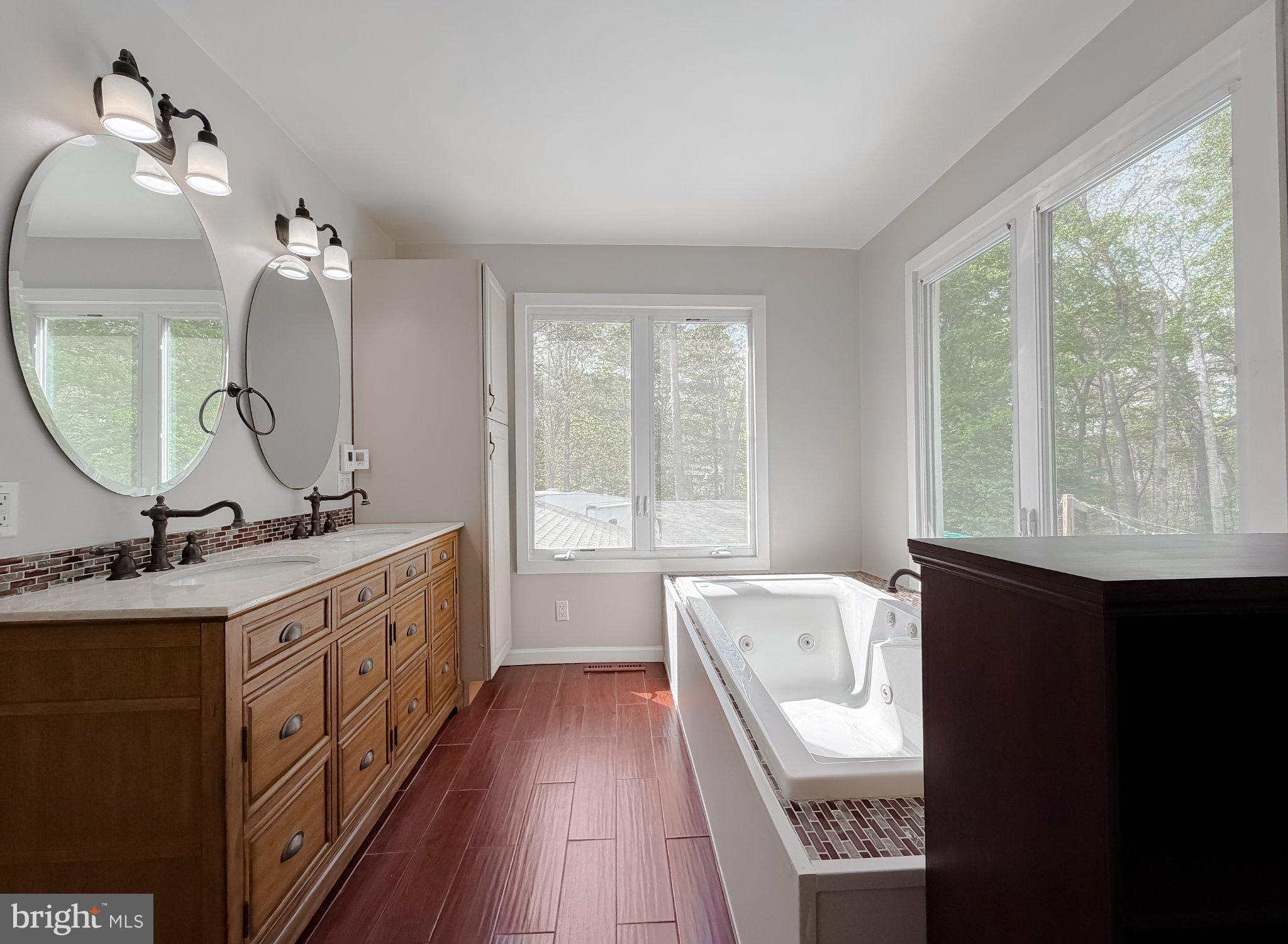 2420 Cecil Lane Huntingtown, MD 20639 - Photo 44 of 72 Serene bathroom with natural light.