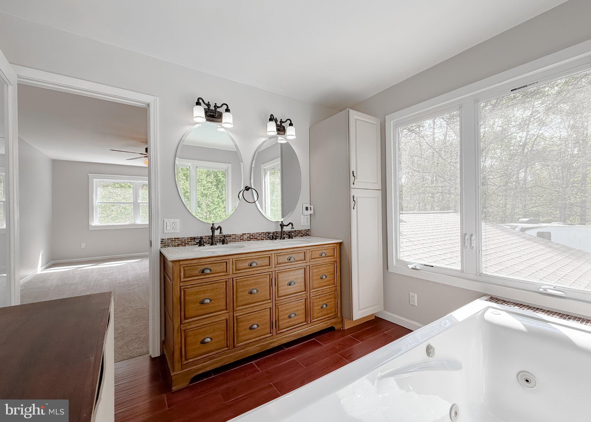 2420 Cecil Lane Huntingtown, MD 20639 - Photo 45 of 72 Bright and airy modern bathroom retreat.