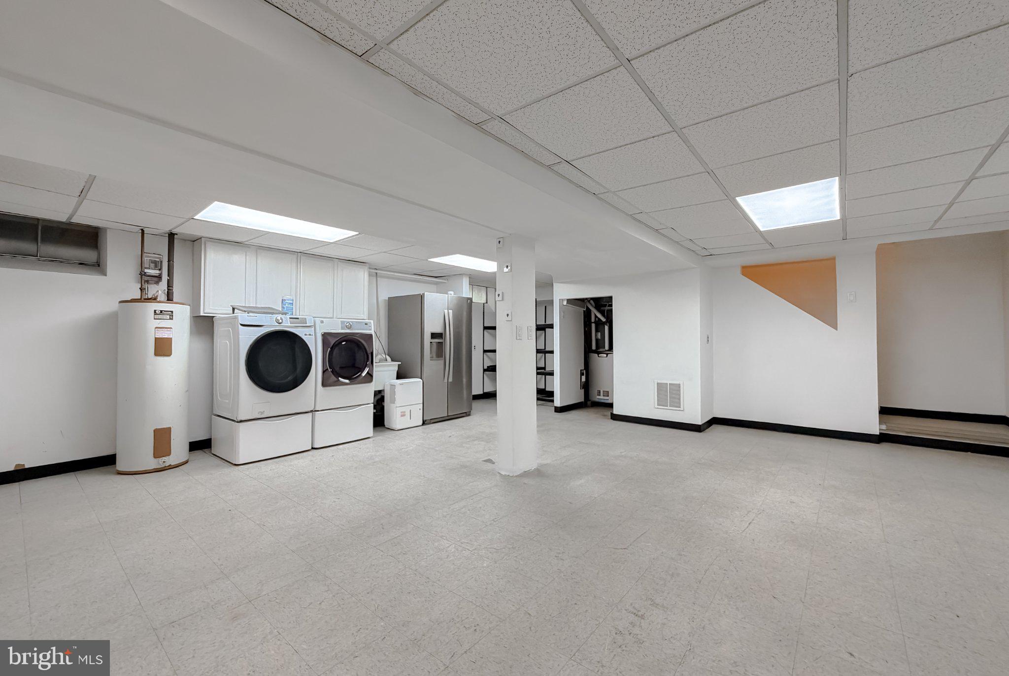2420 Cecil Lane Huntingtown, MD 20639 - Photo 51 of 72 Spacious, versatile basement laundry area.