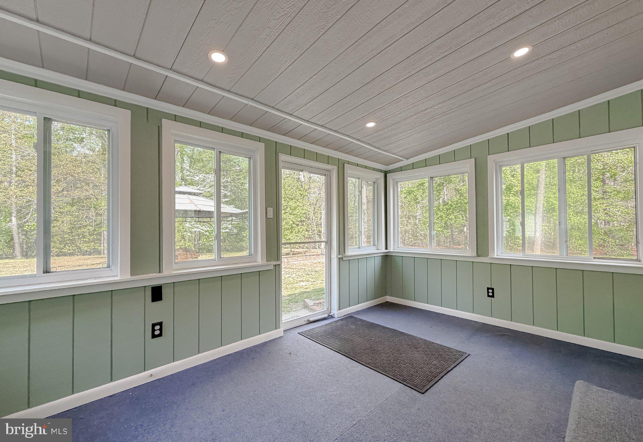 2420 Cecil Lane Huntingtown, MD 20639 - Photo 54 of 72 Bright and airy sunroom retreat.