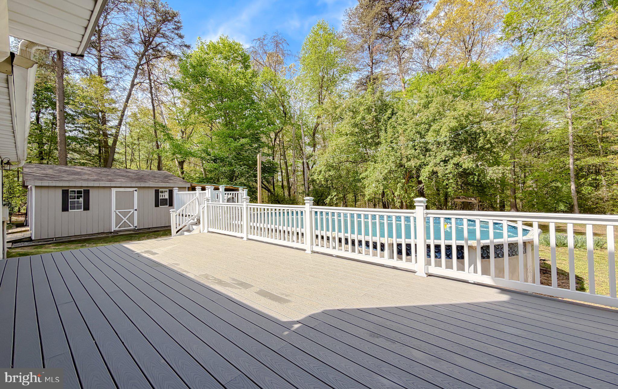 2420 Cecil Lane Huntingtown, MD 20639 - Photo 56 of 72 Tranquil retreat with poolside views.