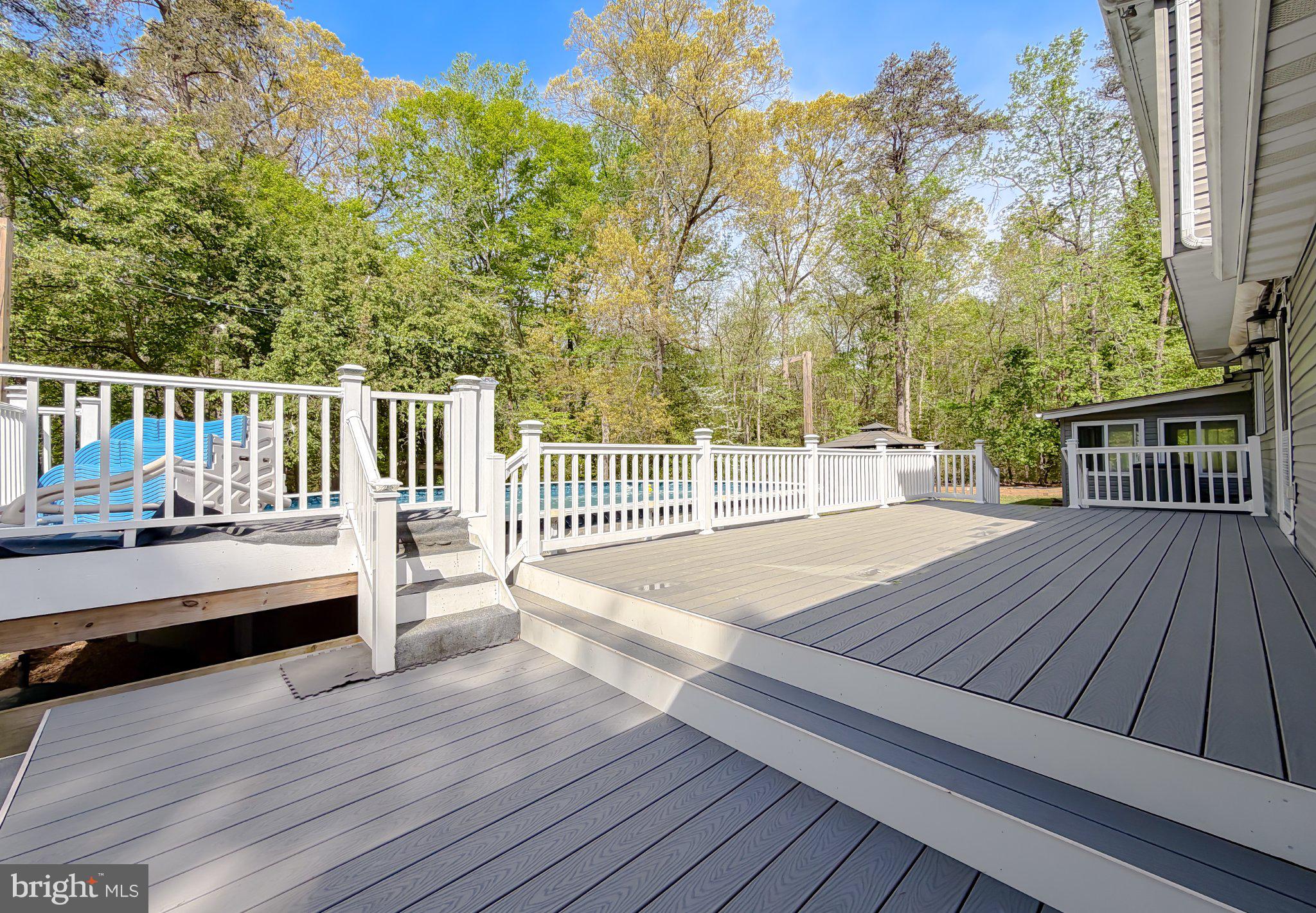 2420 Cecil Lane Huntingtown, MD 20639 - Photo 58 of 72 Serene outdoor retreat with lush greenery.