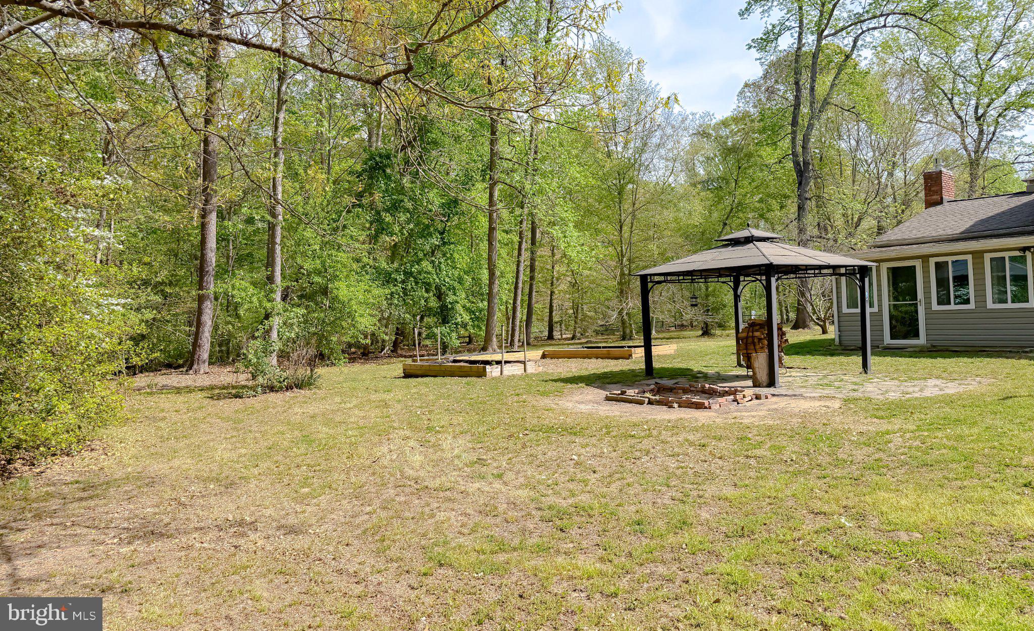 2420 Cecil Lane Huntingtown, MD 20639 - Photo 61 of 72 Serene backyard oasis with gazebo.