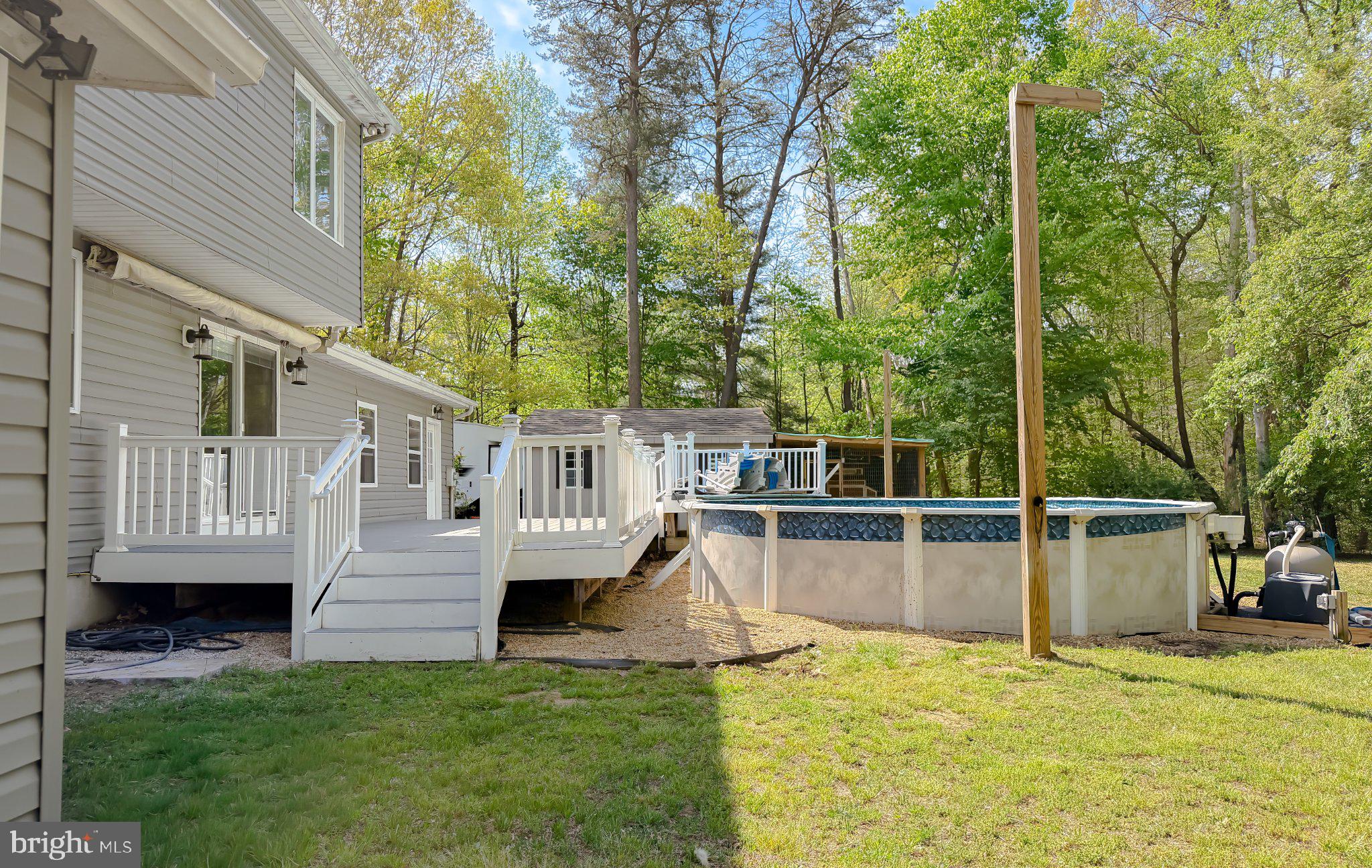 2420 Cecil Lane Huntingtown, MD 20639 - Photo 64 of 72 Serene backyard oasis with pool.