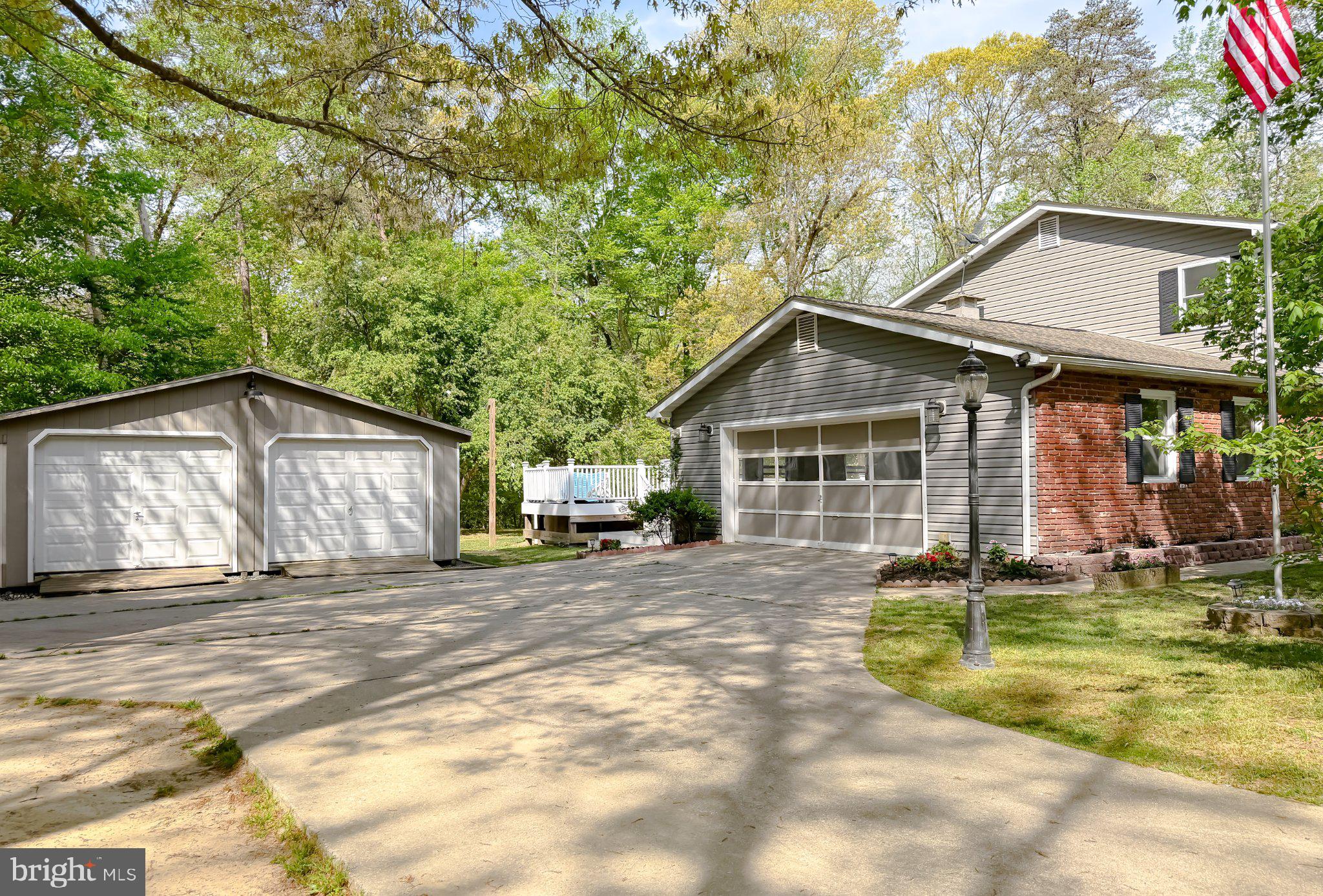 2420 Cecil Lane Huntingtown, MD 20639 - Photo 66 of 72 Charming home nestled in nature's embrace.