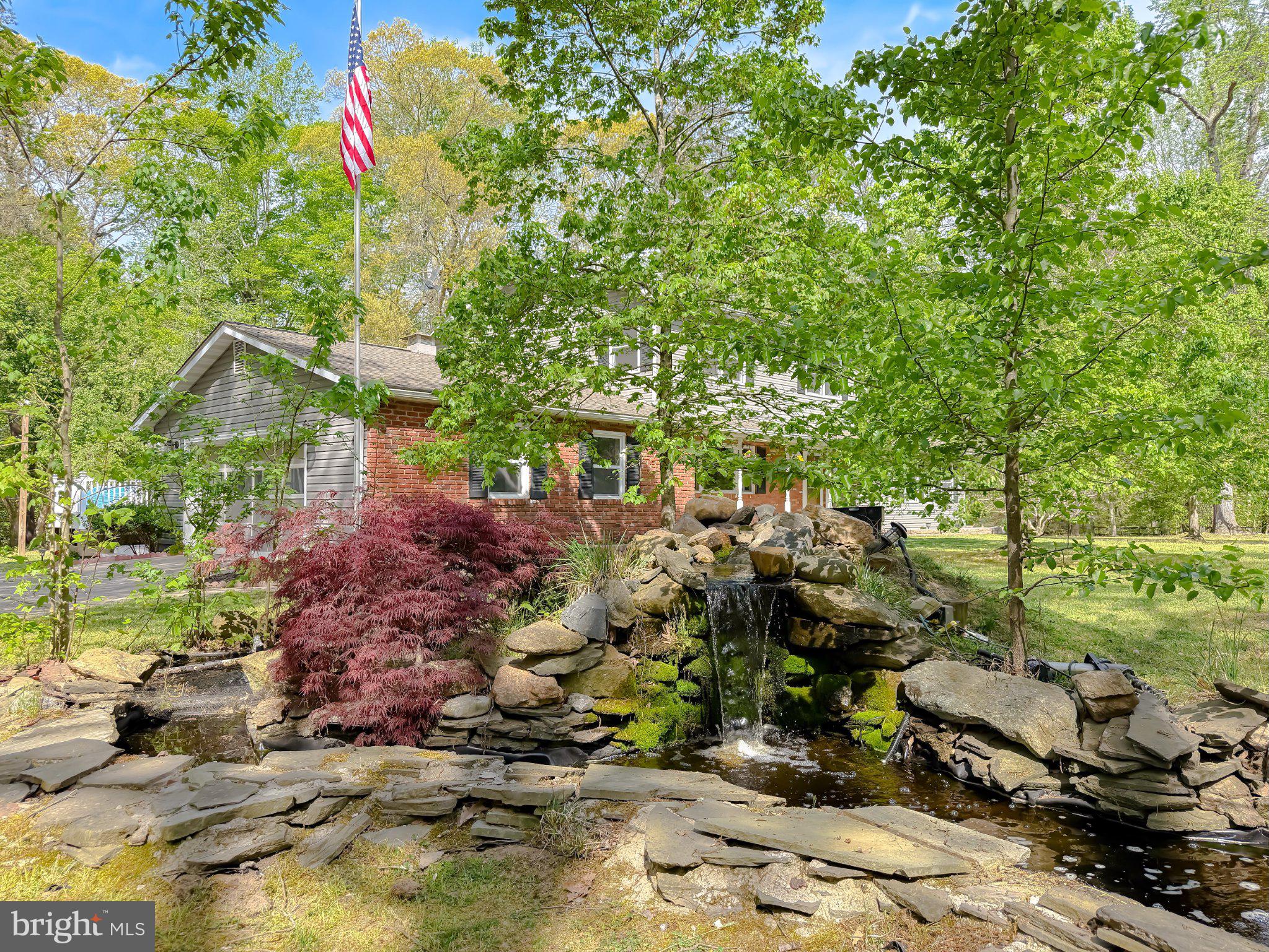 2420 Cecil Lane Huntingtown, MD 20639 - Photo 67 of 72 Tranquil home with serene water feature.