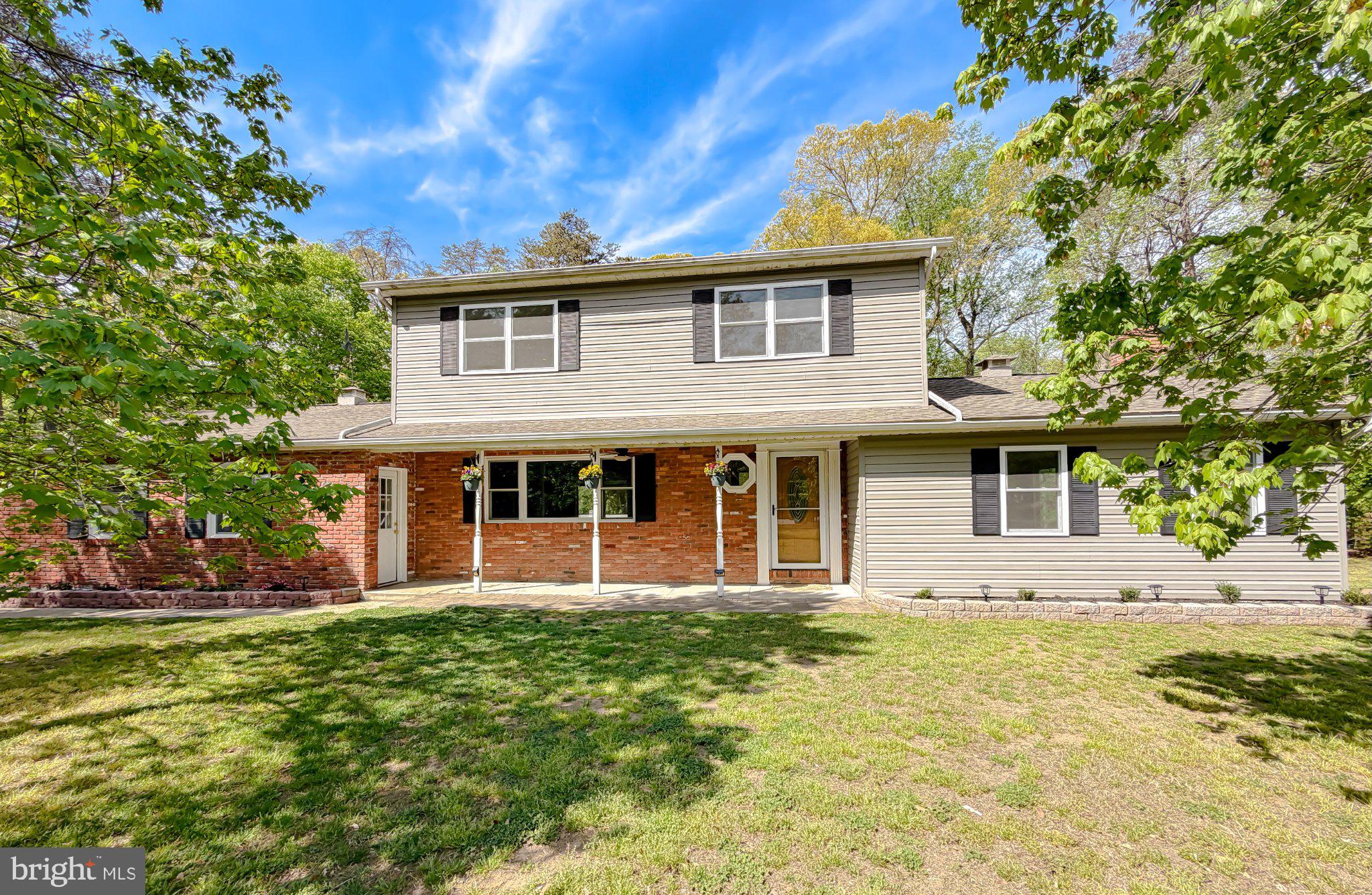 2420 Cecil Lane Huntingtown, MD 20639 - Photo 70 of 72 Charming home with lush greenery.
