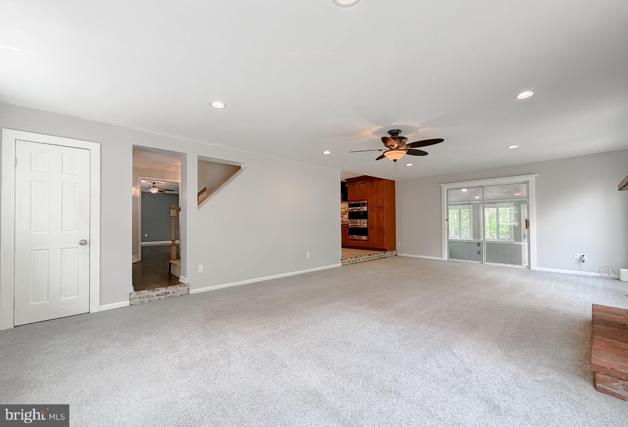 2420 Cecil Lane Huntingtown, MD 20639 - Photo 9 of 72 Spacious, light-filled living area.