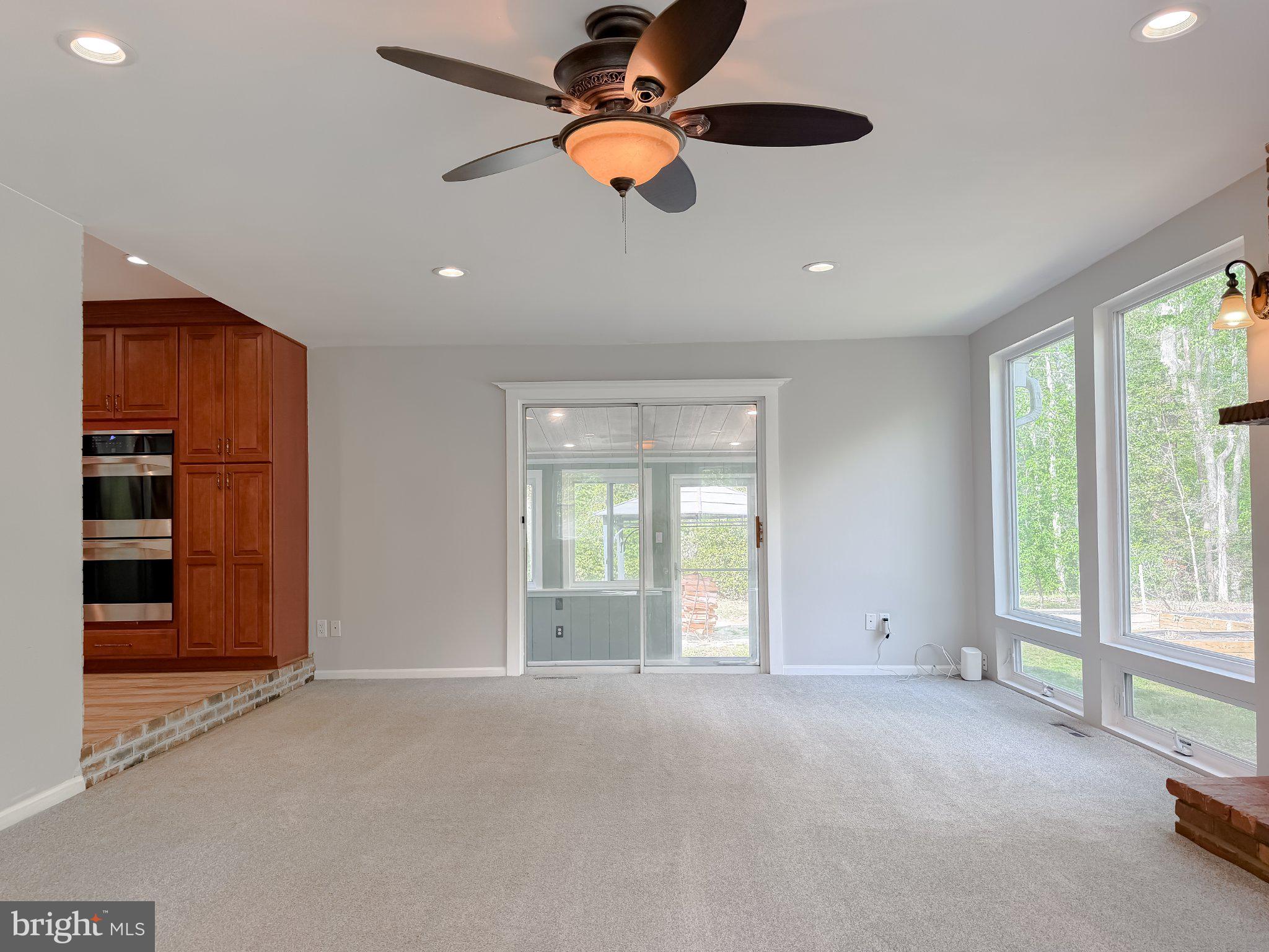 2420 Cecil Lane Huntingtown, MD 20639 - Photo 10 of 72 Bright and airy open living space.