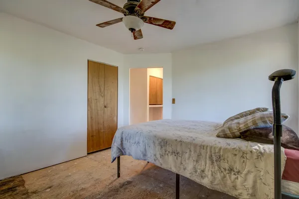 a bathroom with a glass shower door