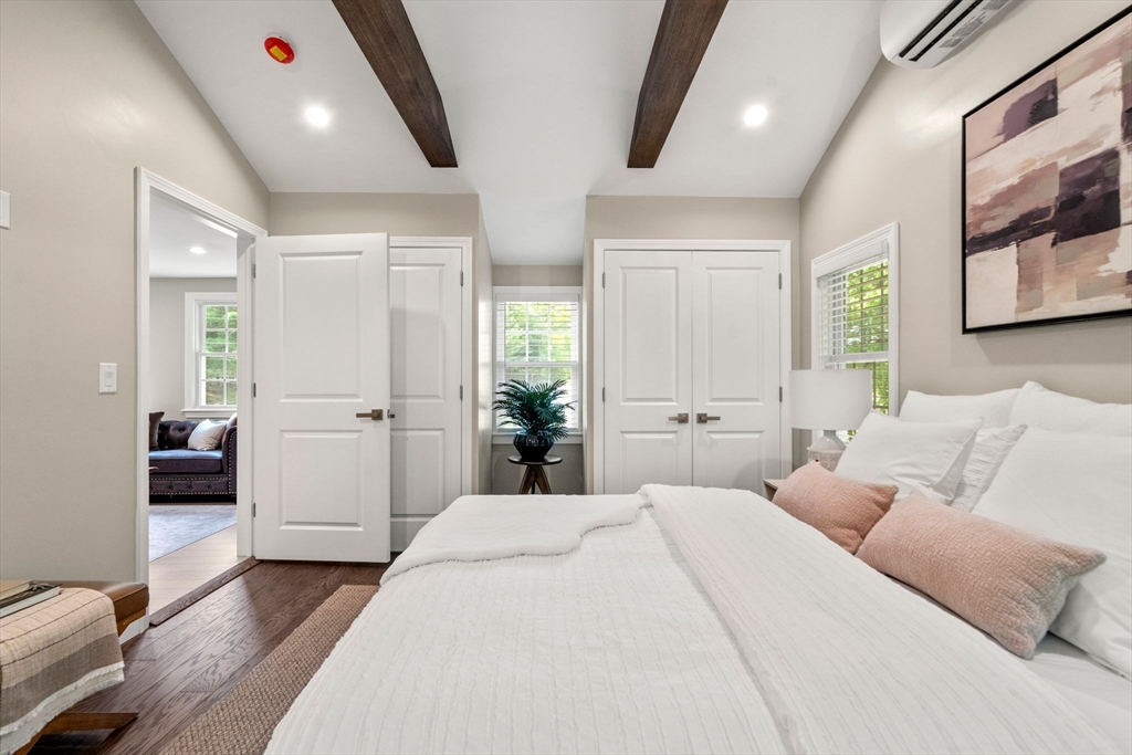 16 Churchill Road Plympton, MA 02367 - Photo 14 of 42 a bedroom with a large bed and furniture