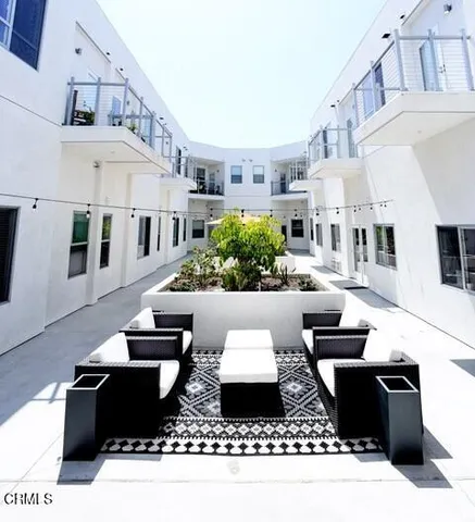 a view of living room filled with furniture