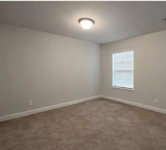 a view of hallway with stairs