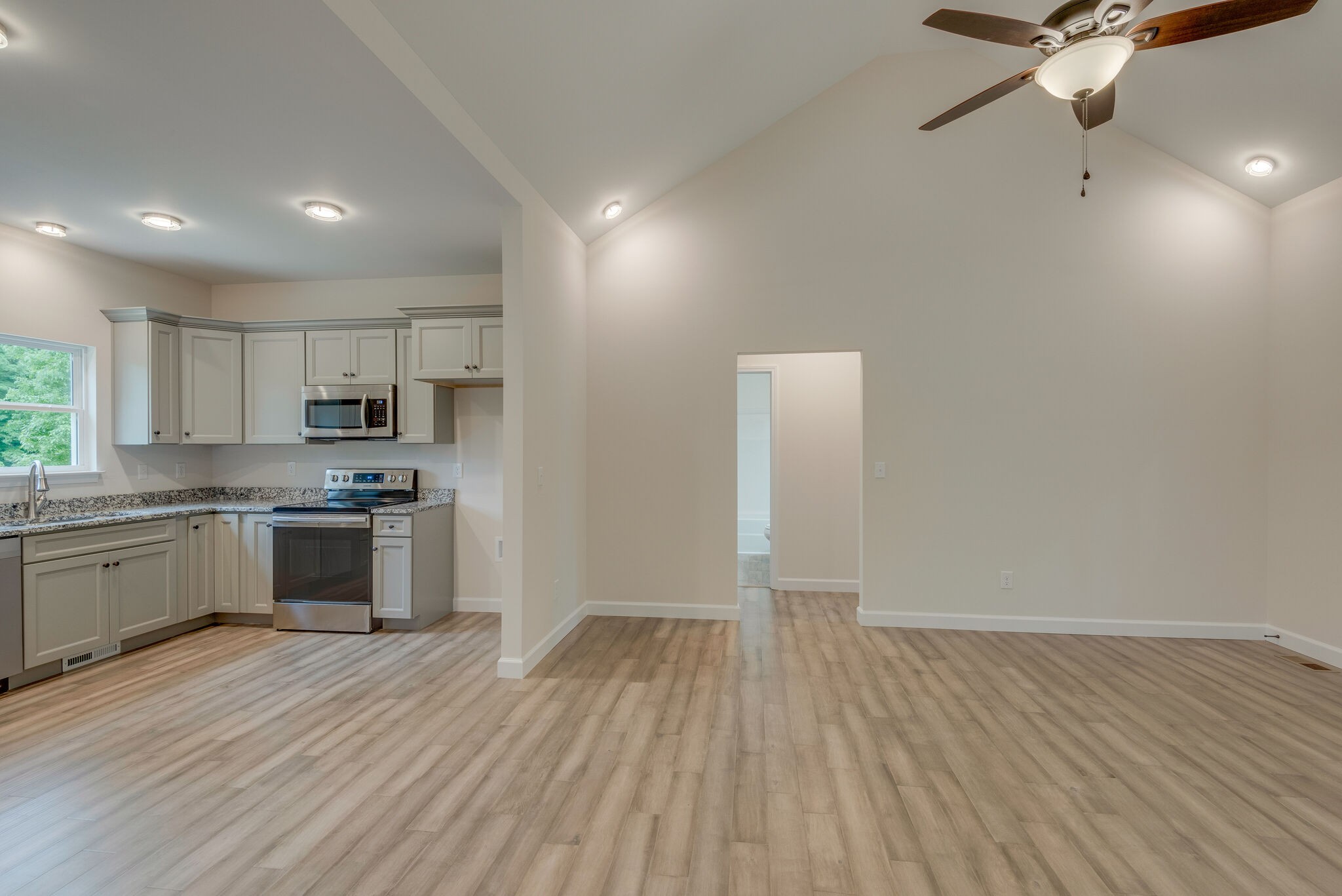 1170 Cowan Road Dickson, TN 37055 - Photo 5 of 30 a large kitchen with a hard wood floor