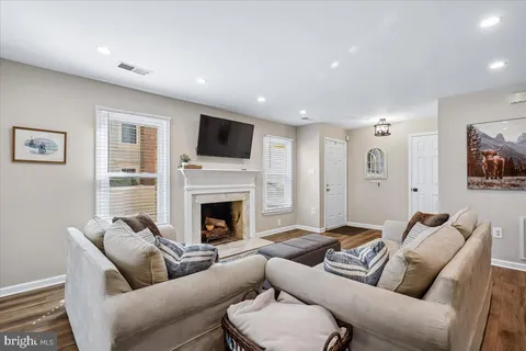 a kitchen with stainless steel appliances a refrigerator sink and stove
