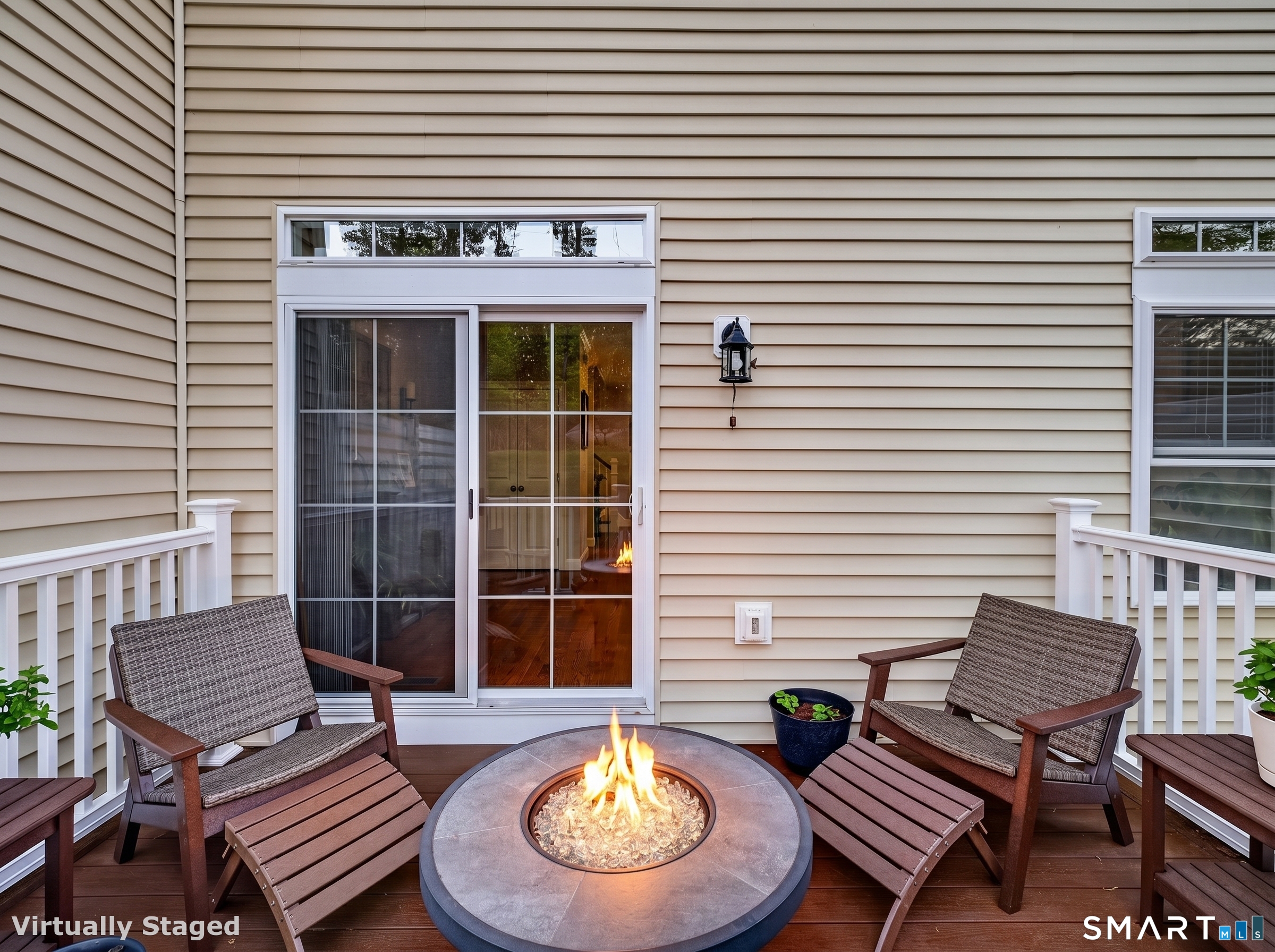 34 Village Crossing, Unit 34 Niantic, CT 06357 - Photo 32 of 38 a view of a chairs and table in back of the house