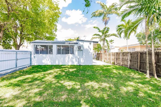 a view of a backyard with a garden
