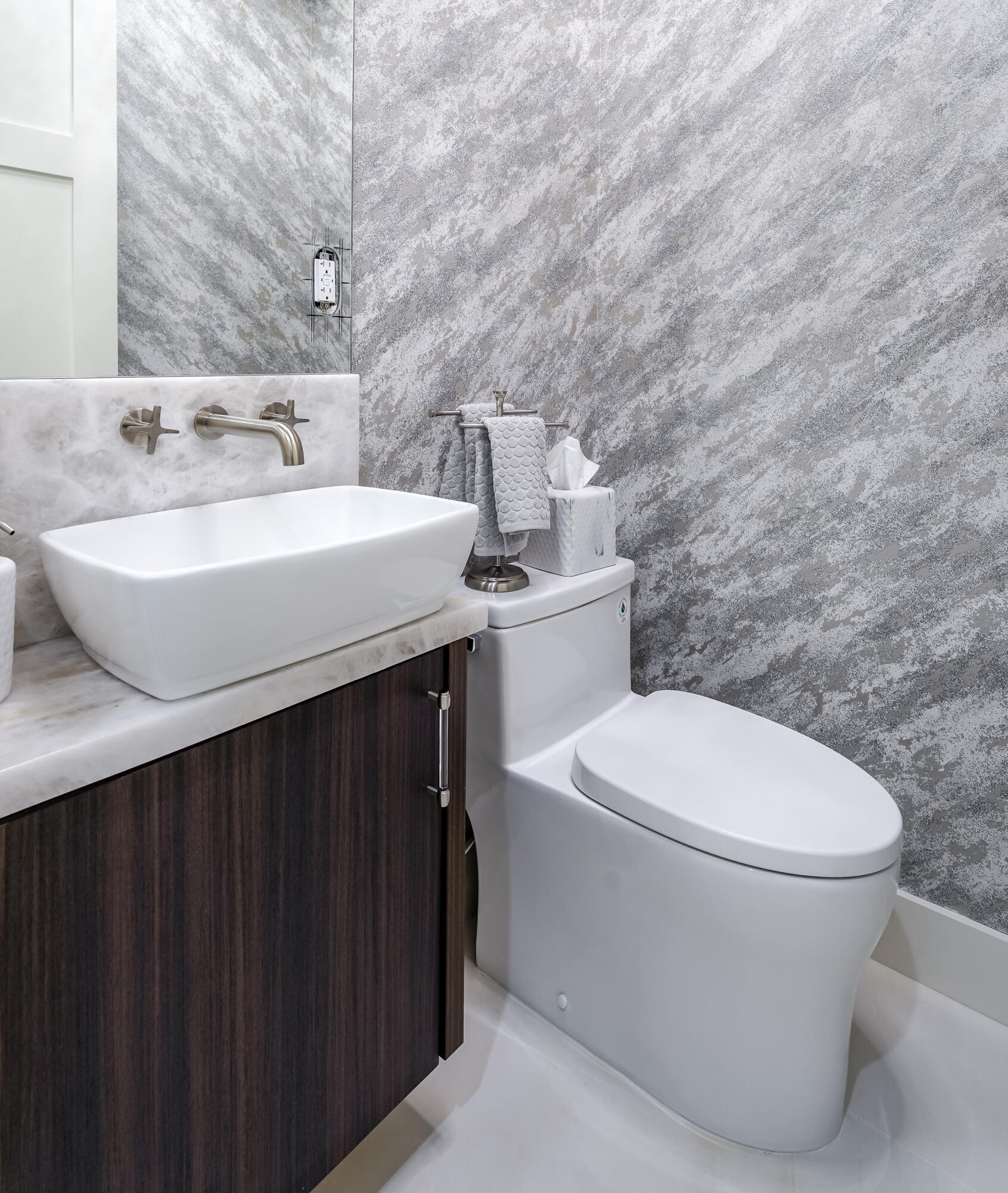 749 Northeast 71st Street Boca Raton, FL 33487 - Photo 17 of 43 a bathroom with a sink a toilet and mirror