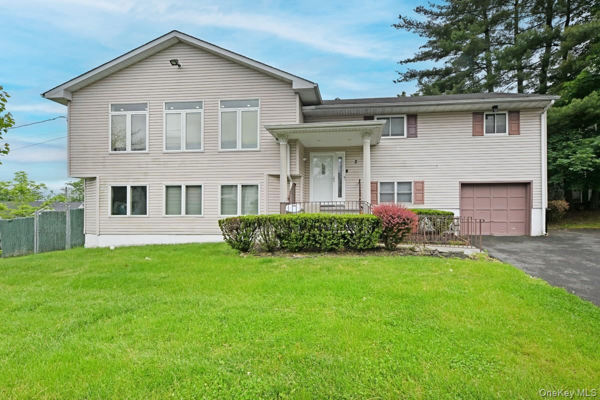 2 Elener Lane Spring Valley, NY 10977 - Photo 1 of 30 a front view of a house with a yard