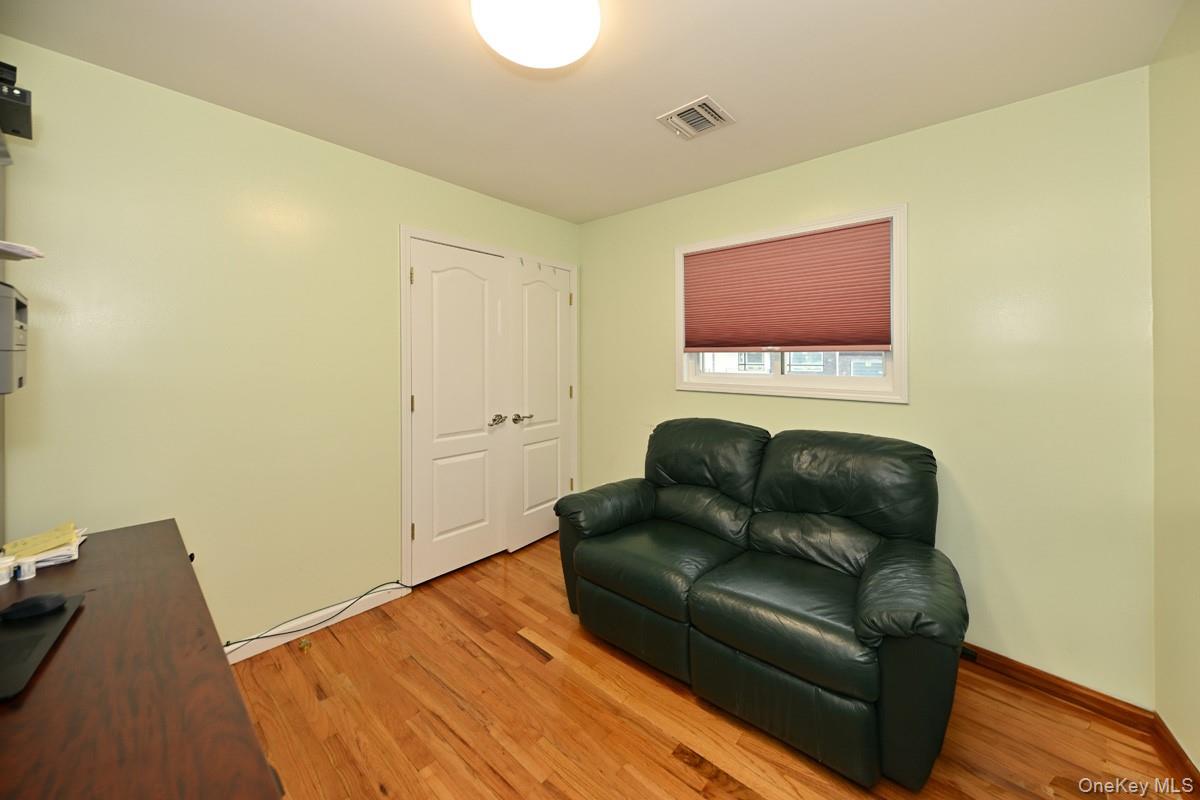 2 Elener Lane Spring Valley, NY 10977 - Photo 13 of 30 a living room with furniture and a wooden floor